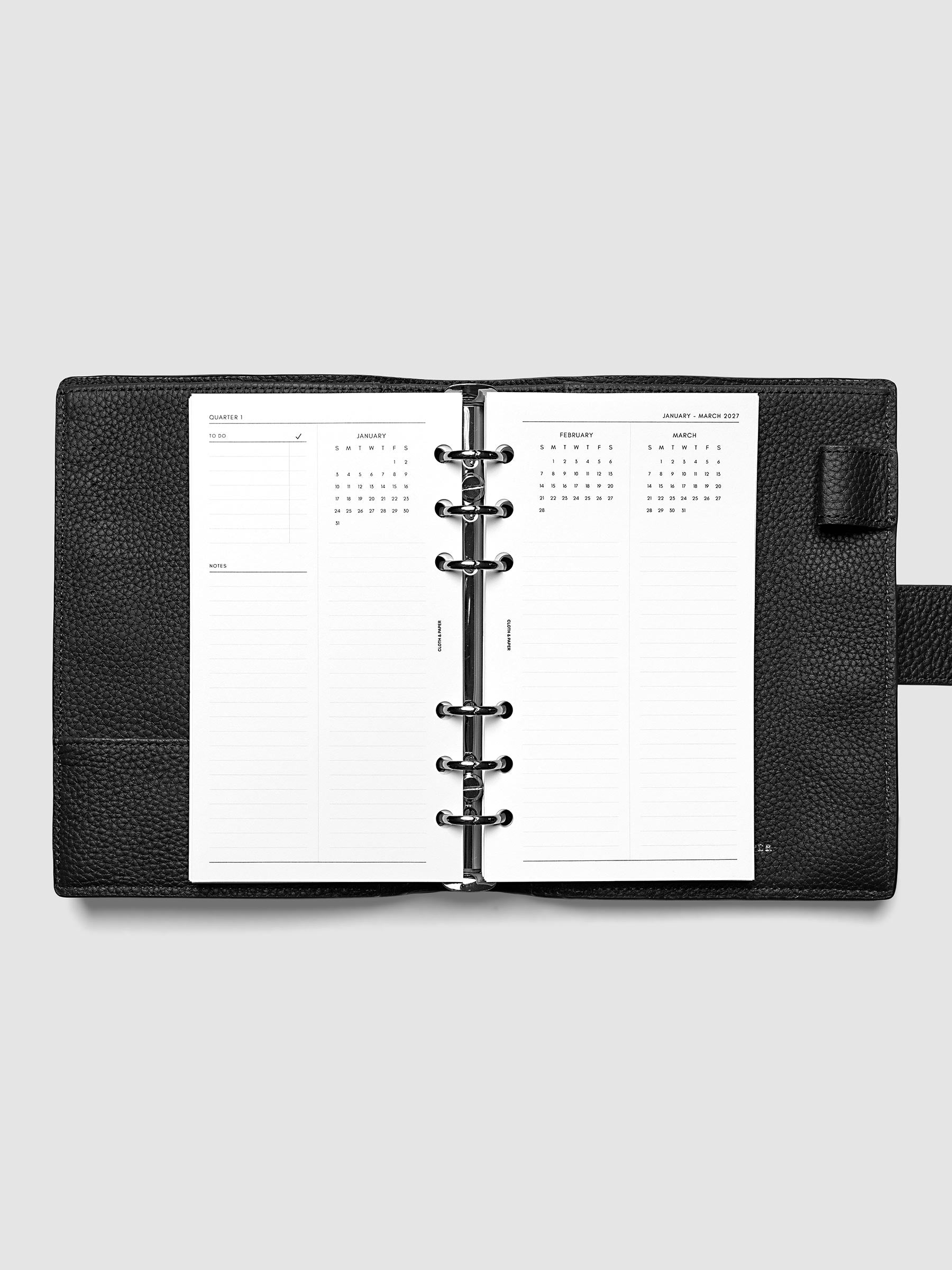 2027 Dated Yearly Overview Planner Inserts Sunday Start, Personal 6-Ring Punch, full quarterly spread showing goal-setting, to-do, and notes sections on the left page alongside three monthly calendar views with notes sections on the right page, shown inside a planner