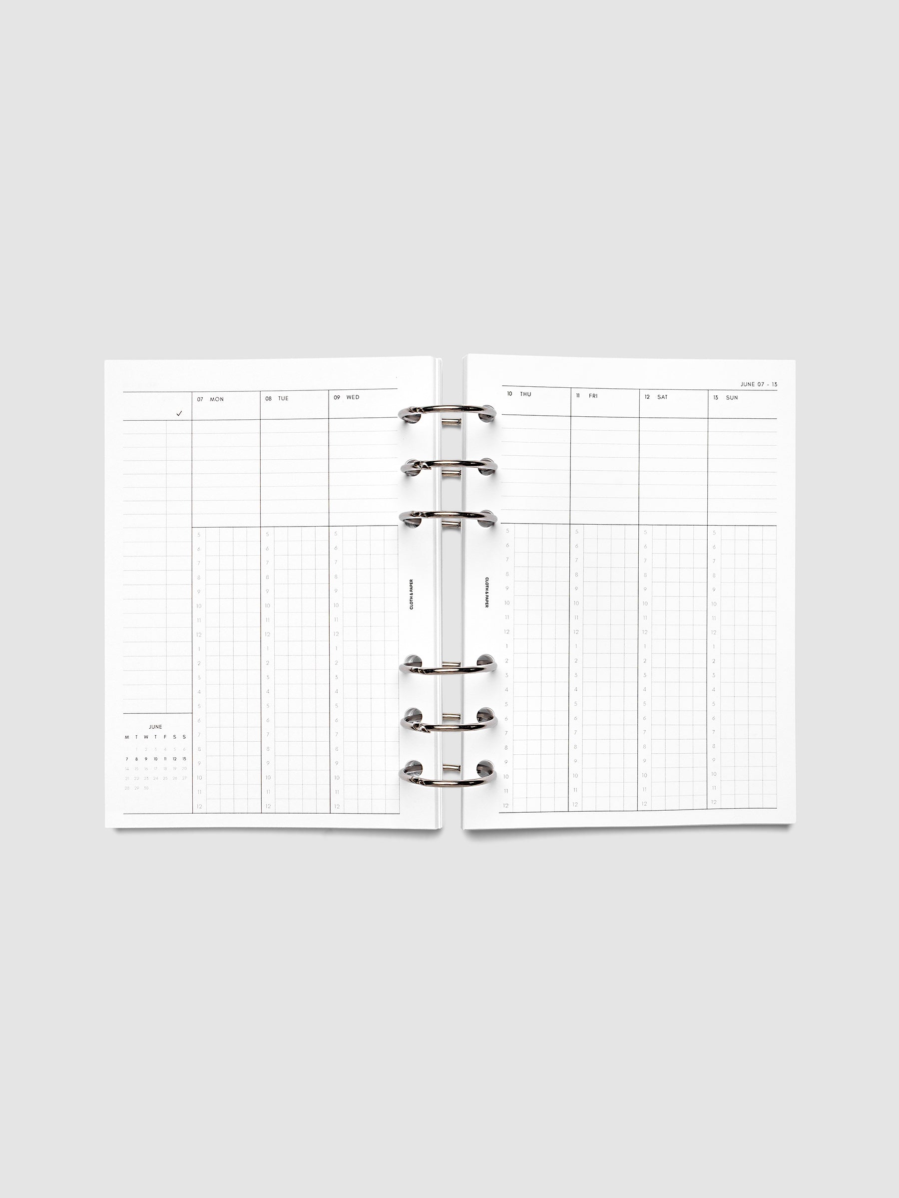 Personal Wide 6-Ring Punch weekly time block spread showing left and right pages in a planner