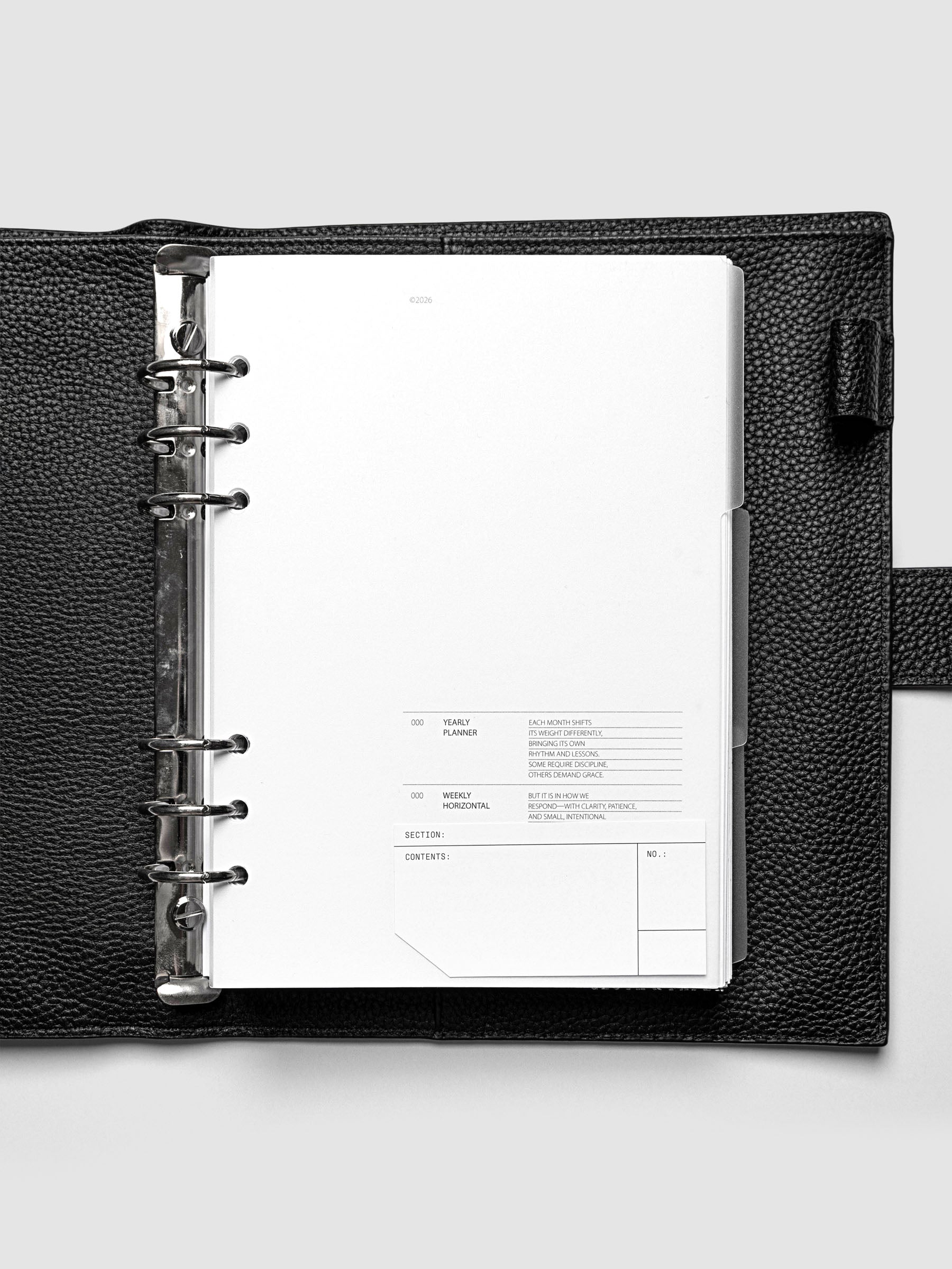 Clear side tab dividers sized for A5 planners shown in use with a blank label with headers section, content, and no.
