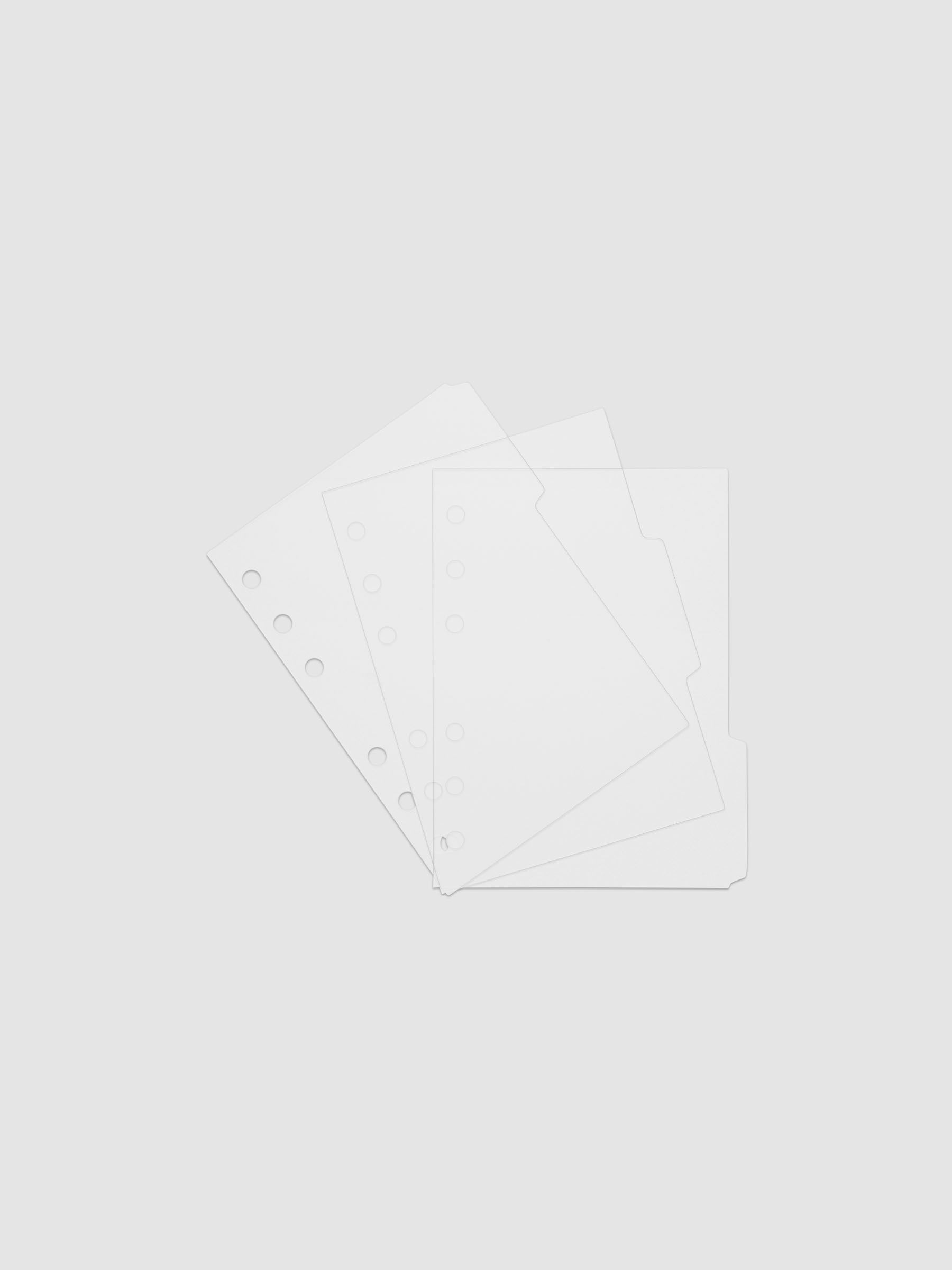 Three 6-ring punch clear side tab dividers sized for A6 planners.