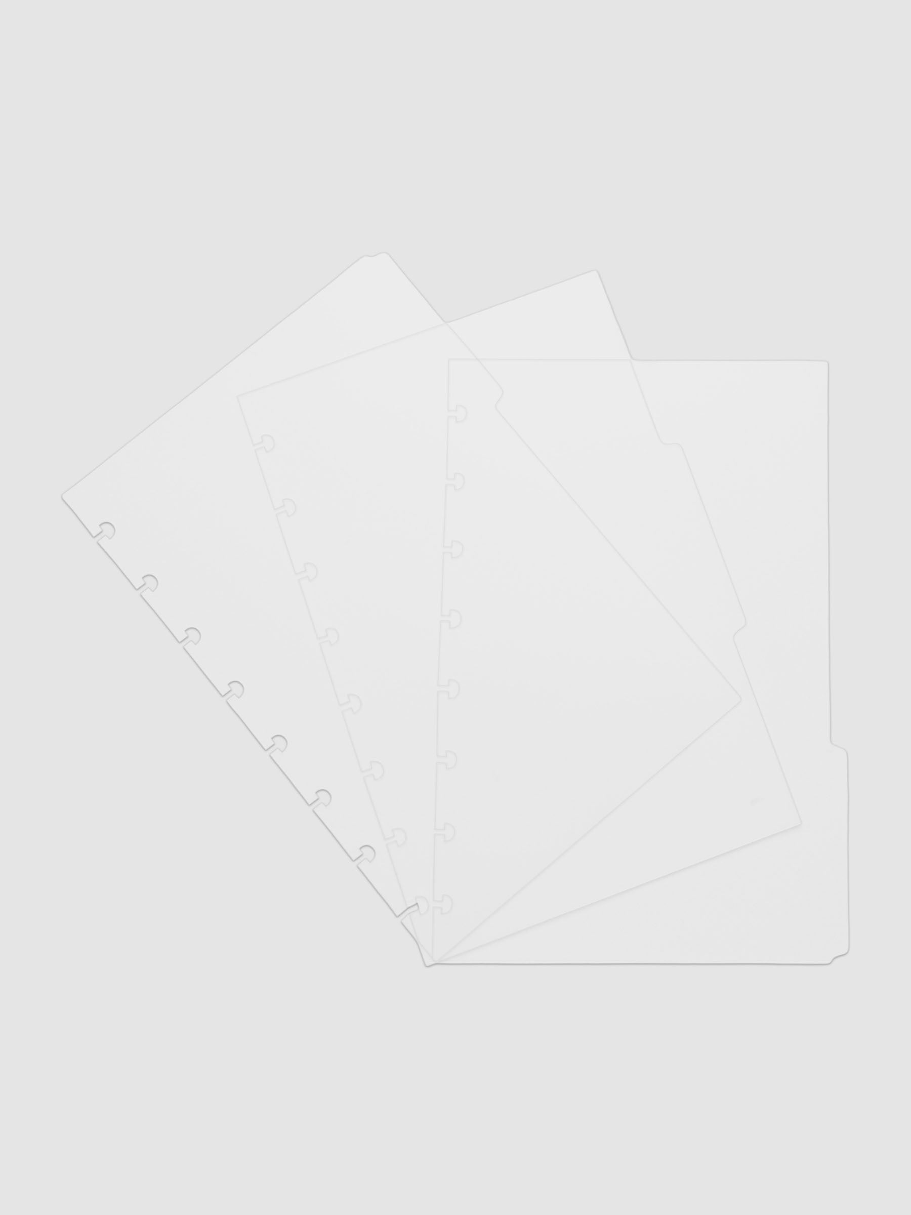 Three 8-disc punch clear side tab dividers sized for Half Letter planners.