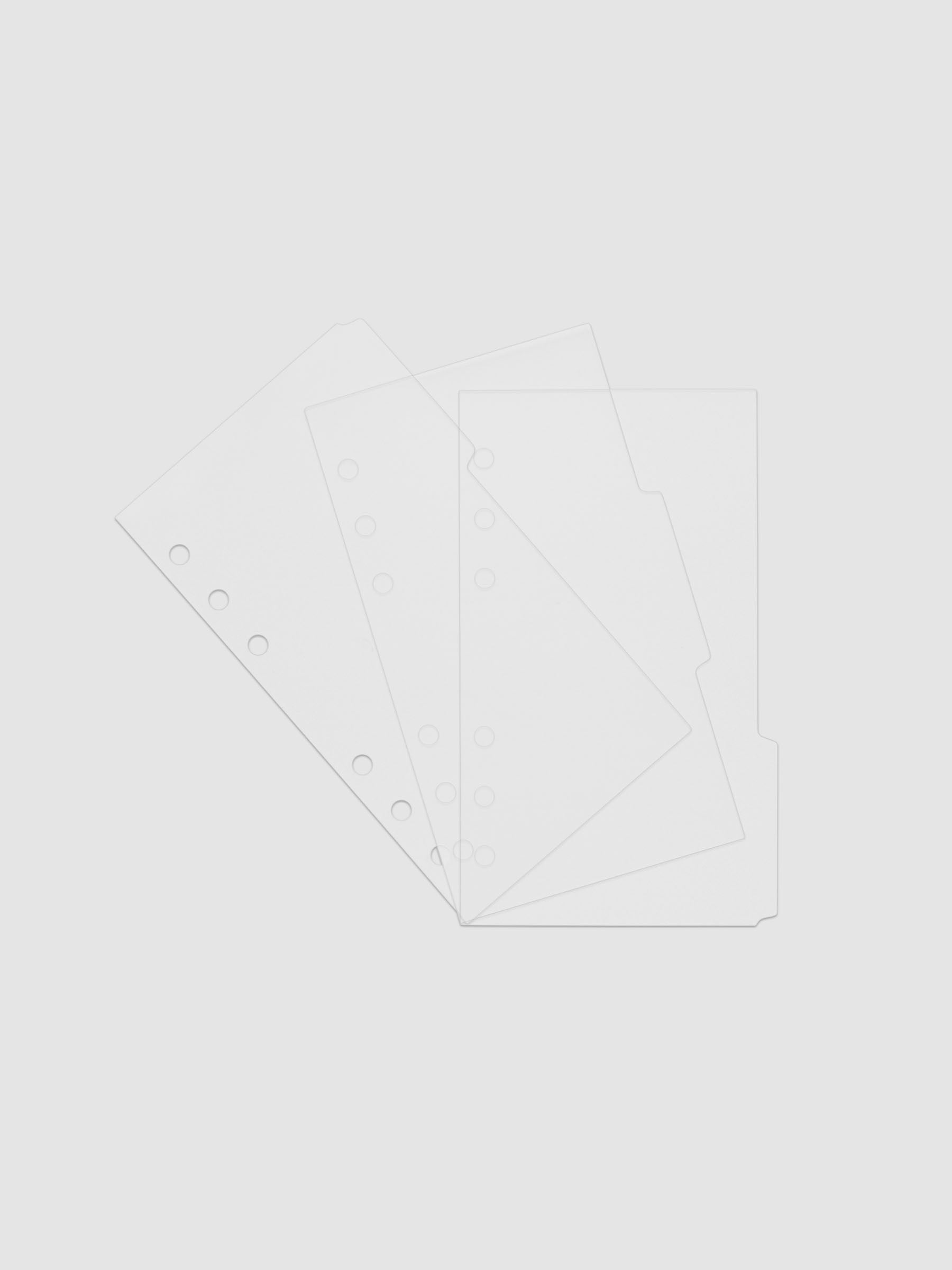 Three 6-ring punch clear side tab dividers sized for Personal planners.