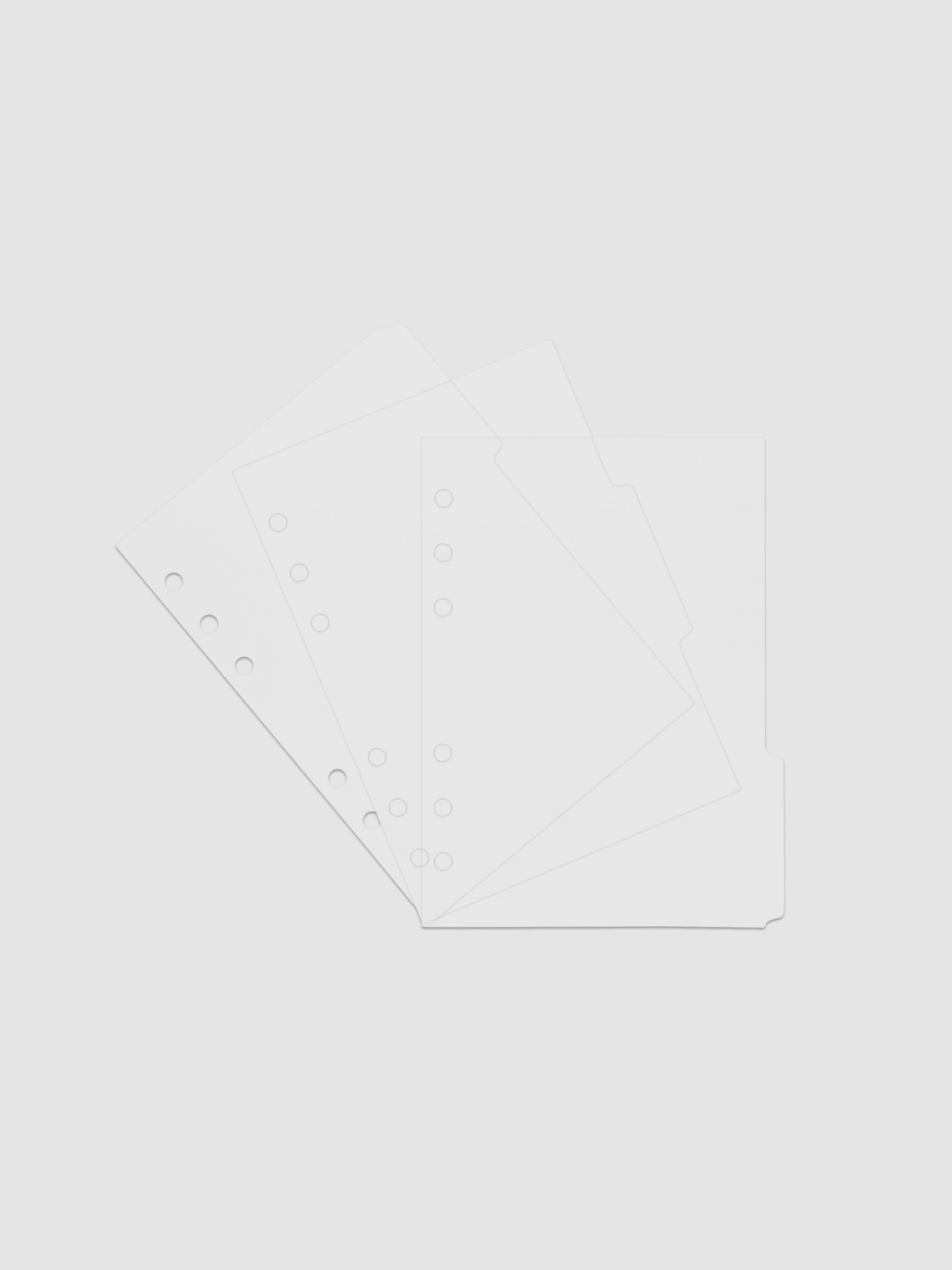 Three 6-ring punch clear side tab dividers sized for Personal Wide planners.