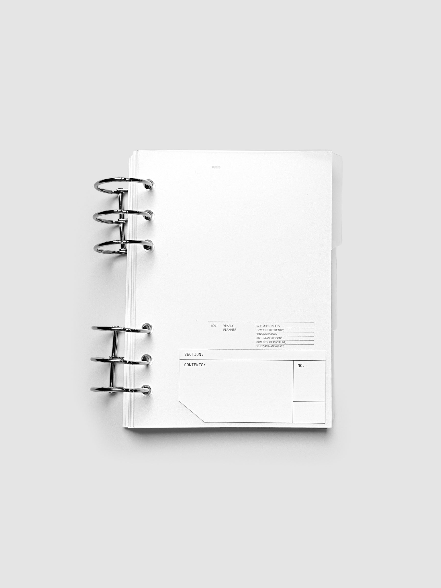 Clear side tab dividers sized for Personal Wide planners shown in use with a blank label with headers section, content, and no.
