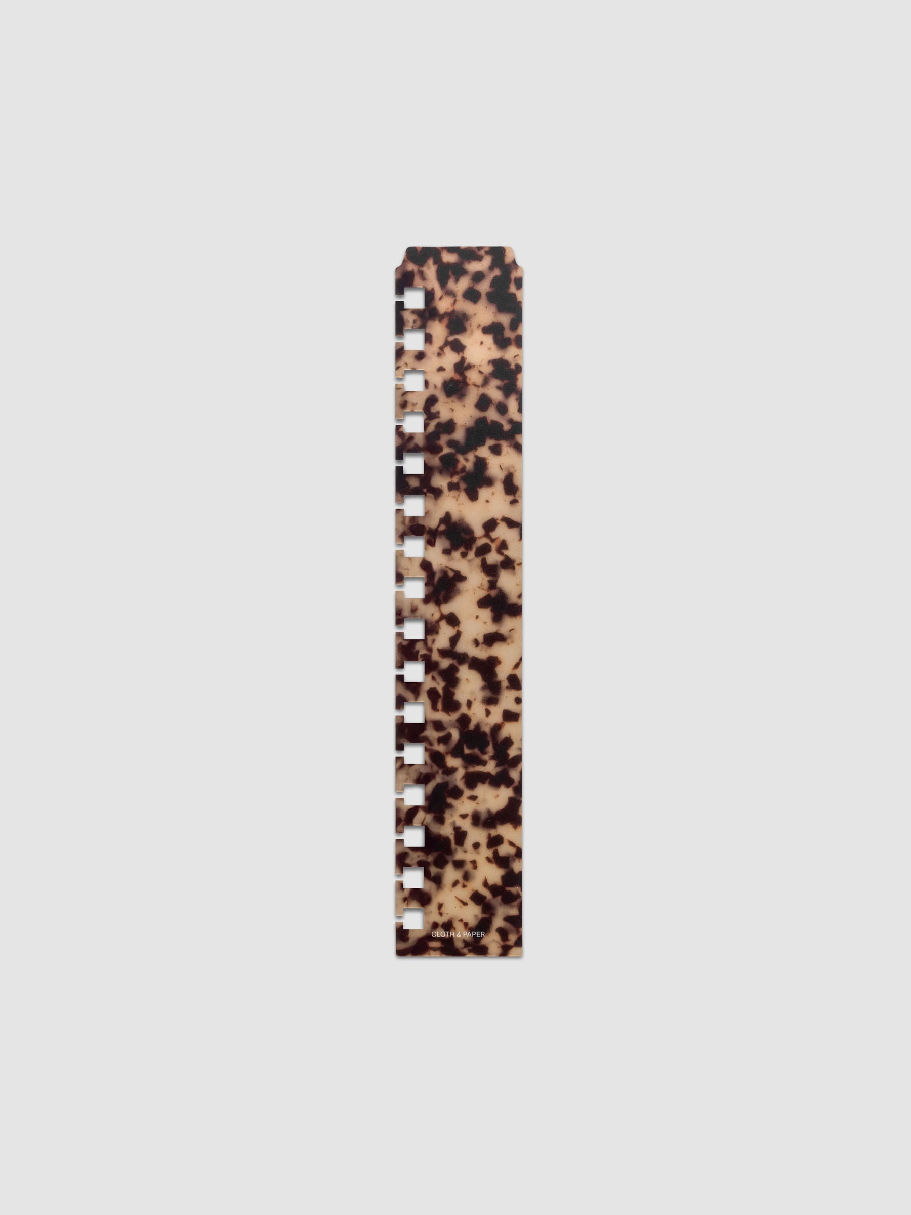 One narrow page marker in tortoiseshell pattern, shown in size A5 Spiral.