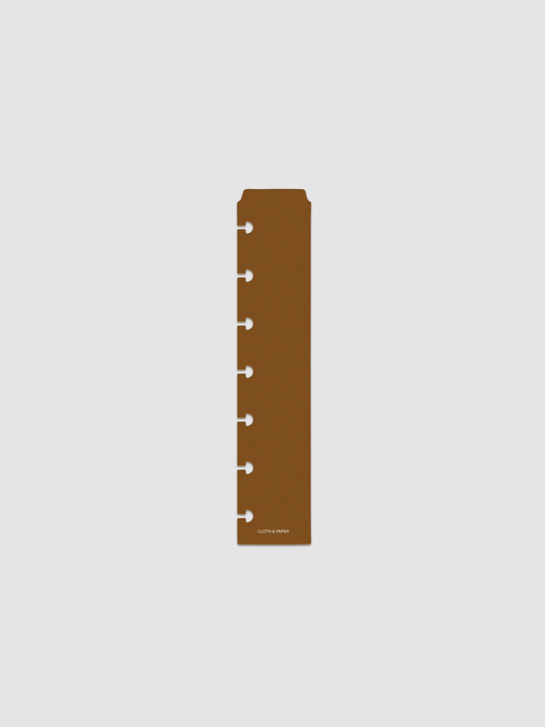 One narrow page marker in brown, shown in size HP Mini.