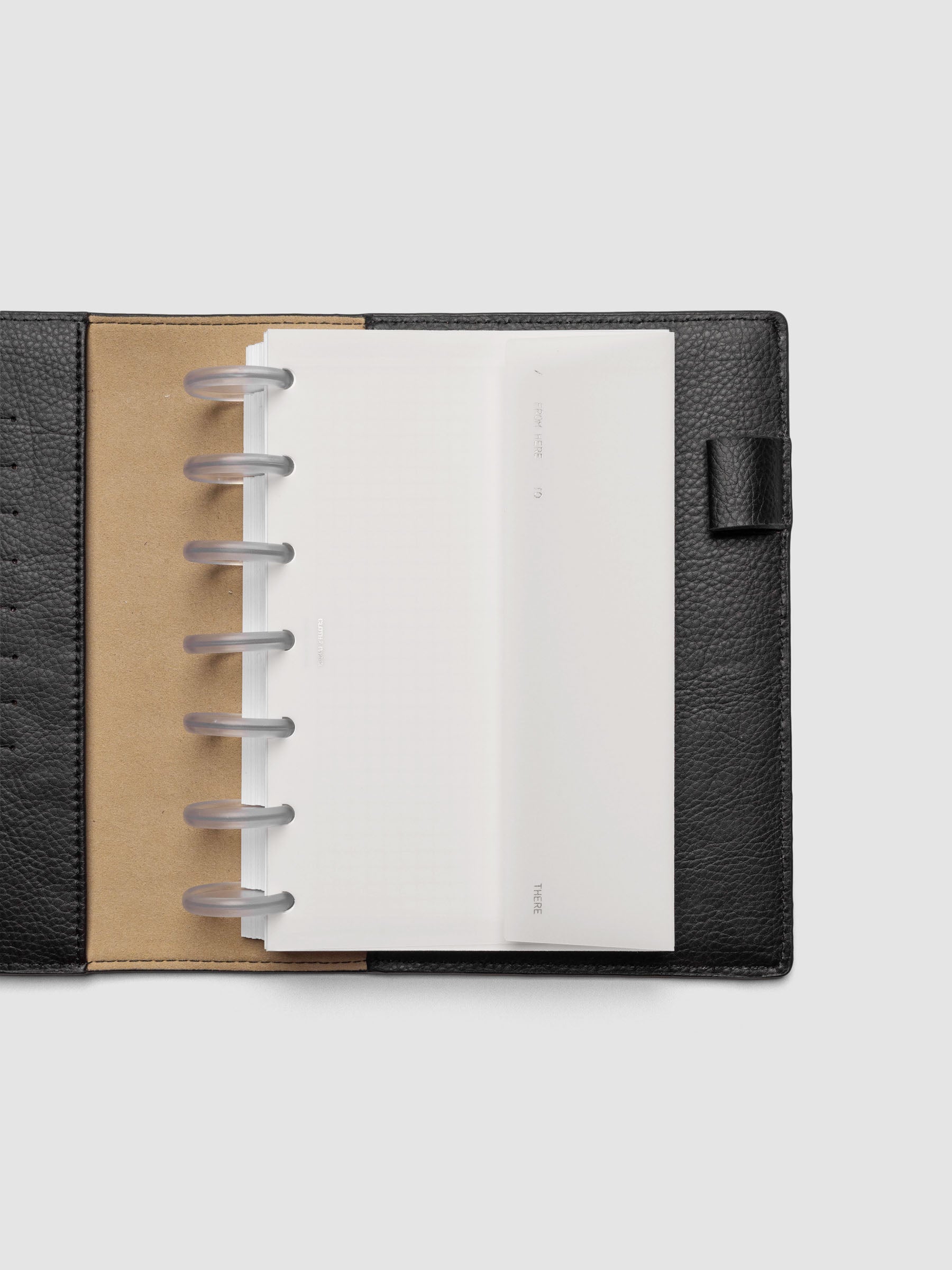 White Envelope Storage Holder shown inside a black, leather HP Mini folio.