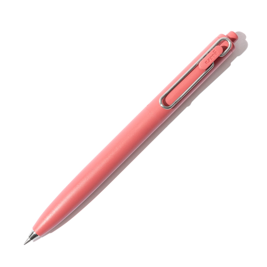 Red pen turned to the right against a white background.
