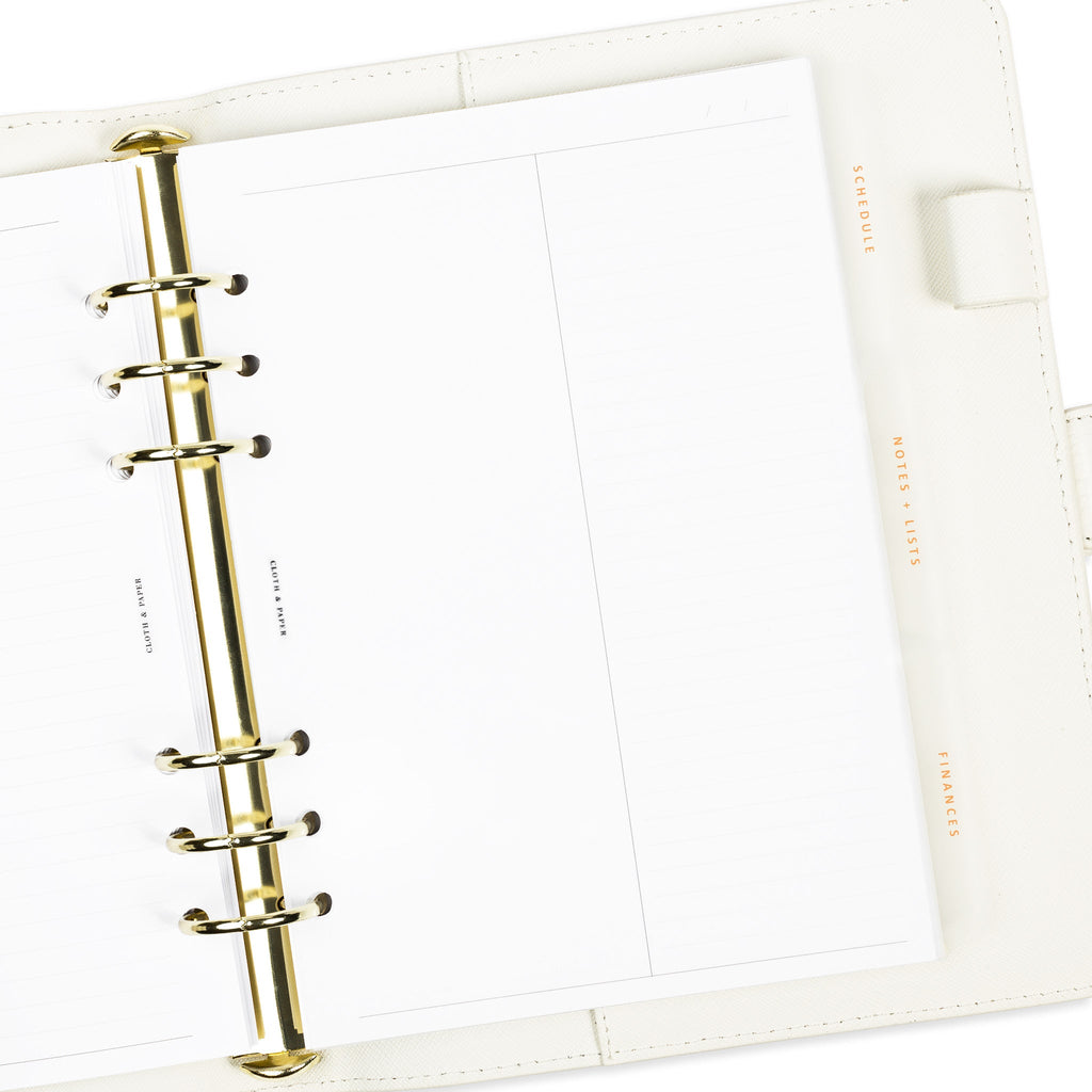 Tabs in use inside a white 6-ring planner agenda.