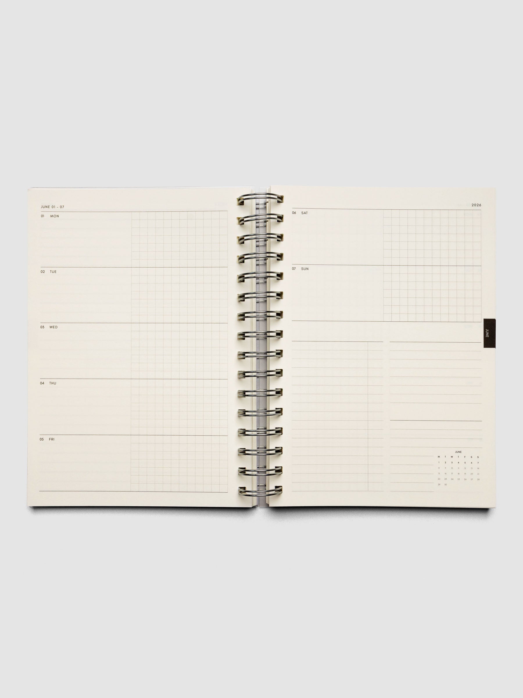 2026 Weekly Horizontal Notebook | Monday Start | A5 Spiral shown open on a weekly layout page displaying silver spiral binding and cream paper.