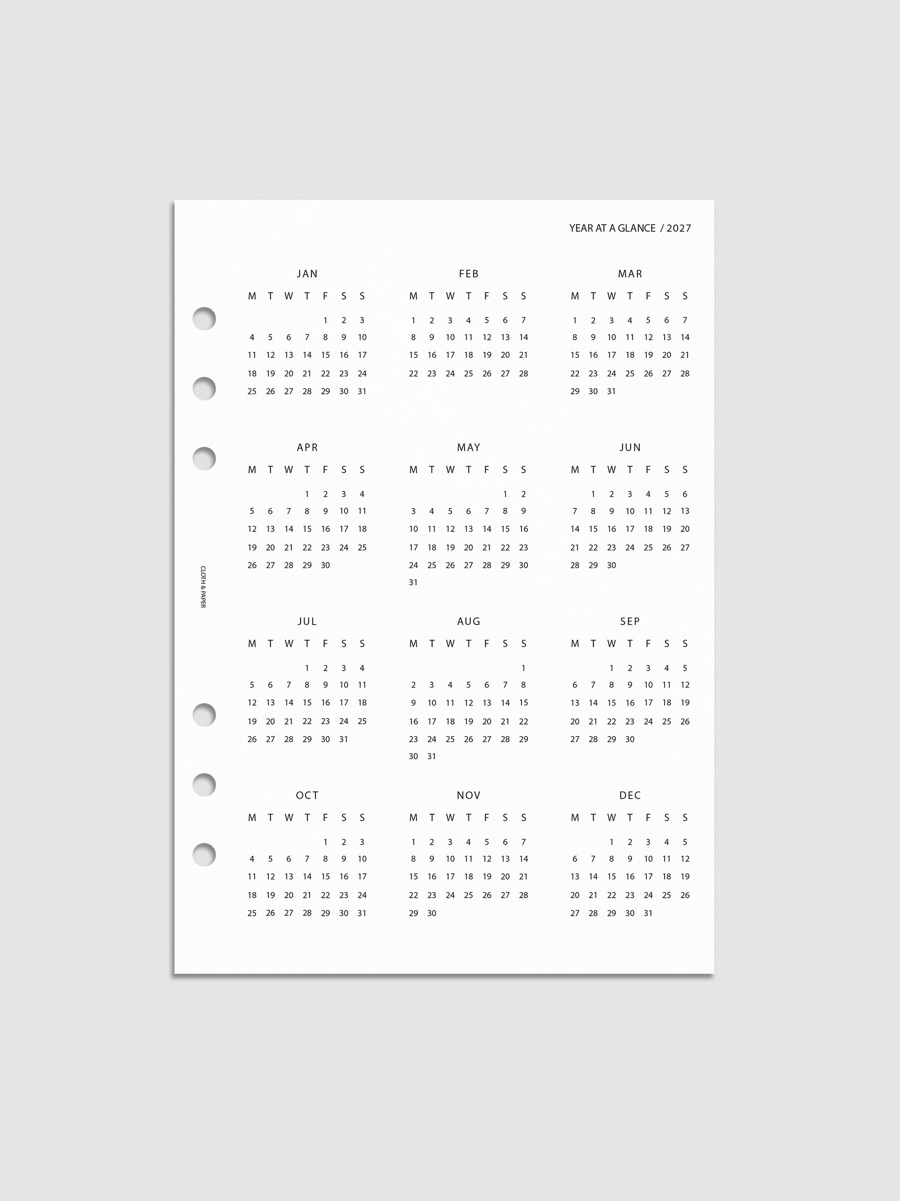 2027 Year At A Glance Dashboard Monday Start, A5 6-Ring Punch, translucent vellum dashboard printed with a full year calendar in Monday-start format