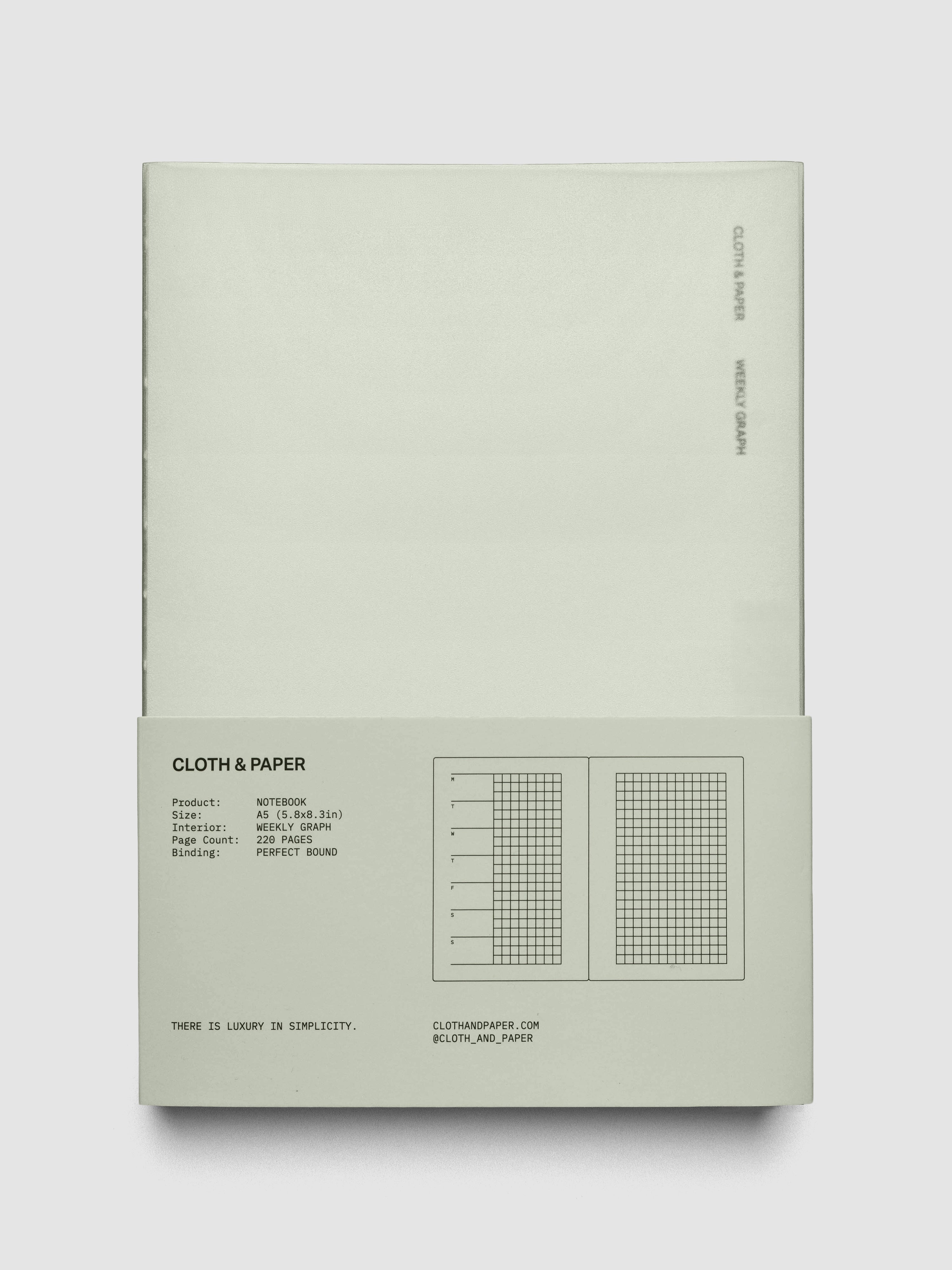 Perfect Bound Notebook | A5 | Weekly Agenda | Matcha shown closed, laying flat, in packaging on a neutral background.