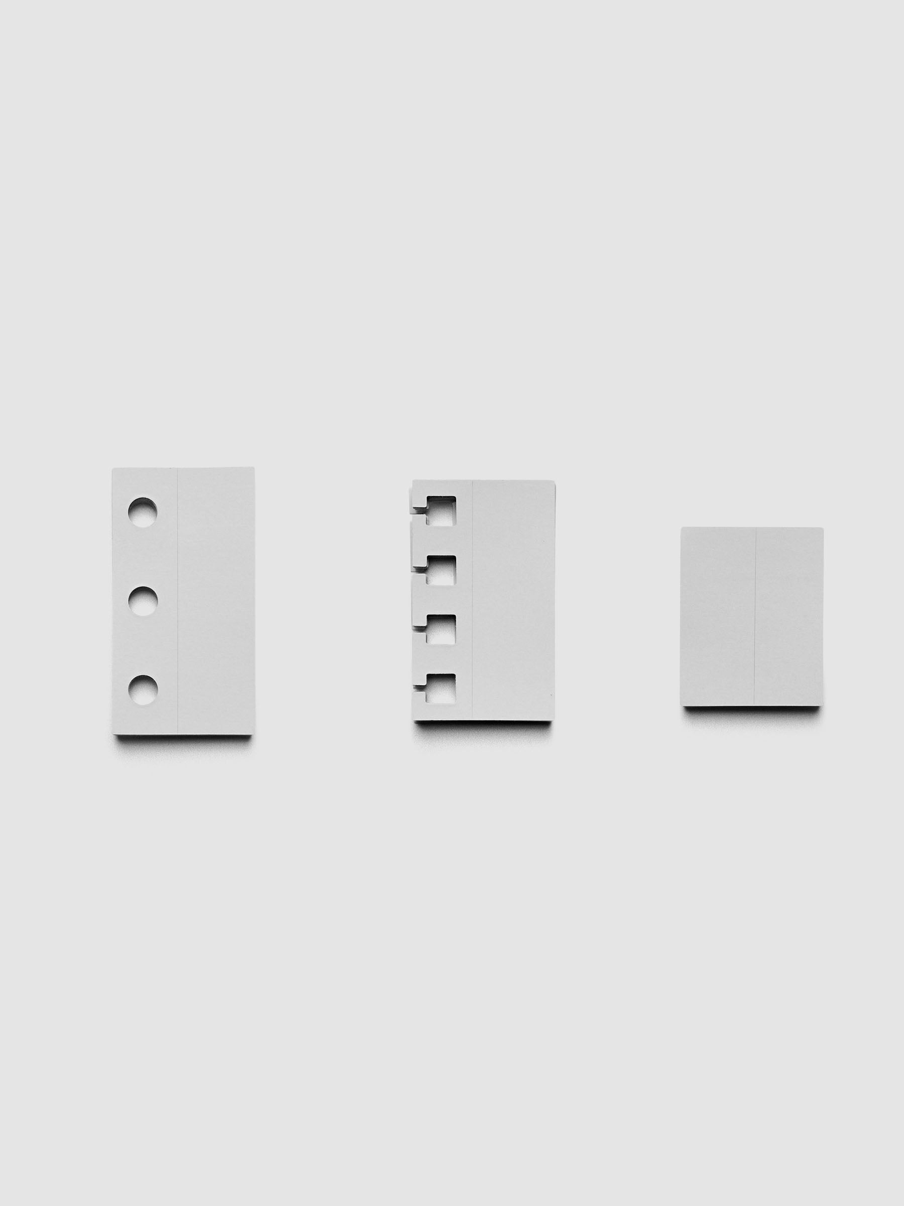 One of each system punch stickers in the ring punch option, including ring punch, spiral punch, and unpunched.