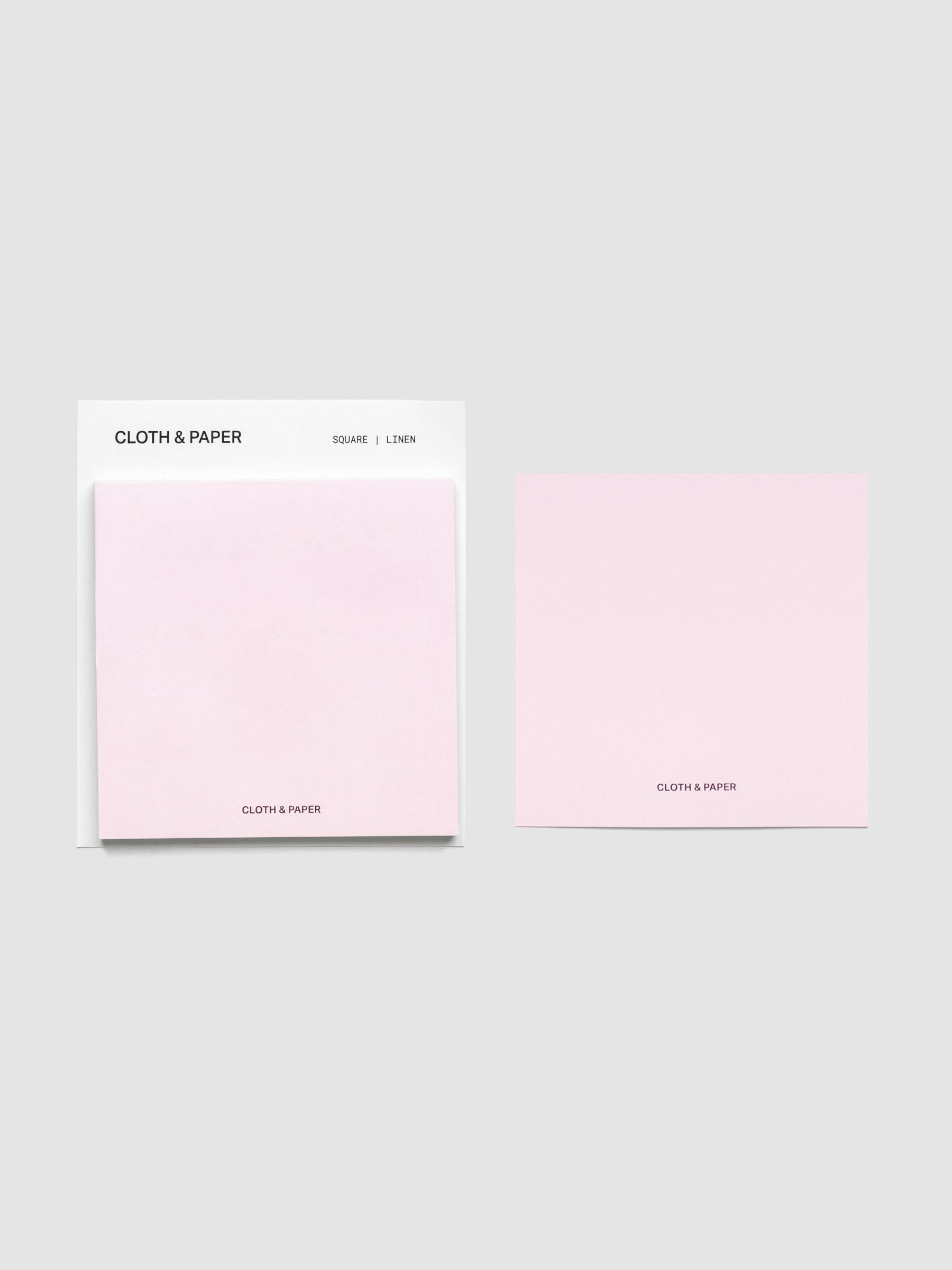 Sticky note set displayed against a neutral background. One note is placed on the packaging's edge. Color shown is Linen.