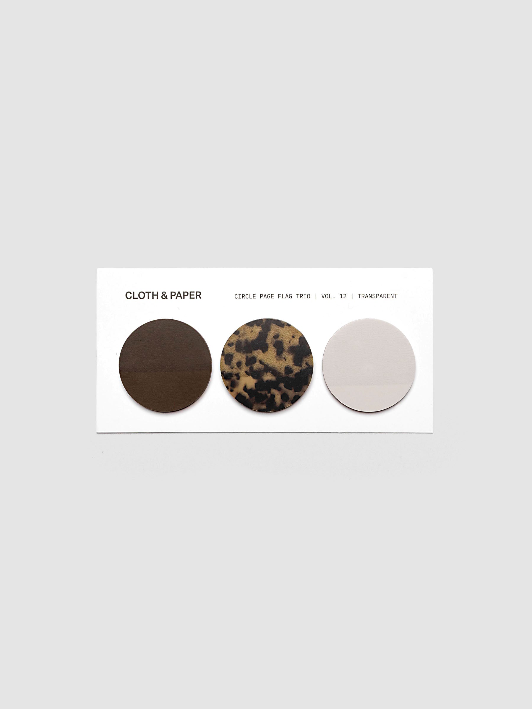 Circle Page Flag Trio | Walnut, Desert Tortoiseshell, Ibiza on a backing card.