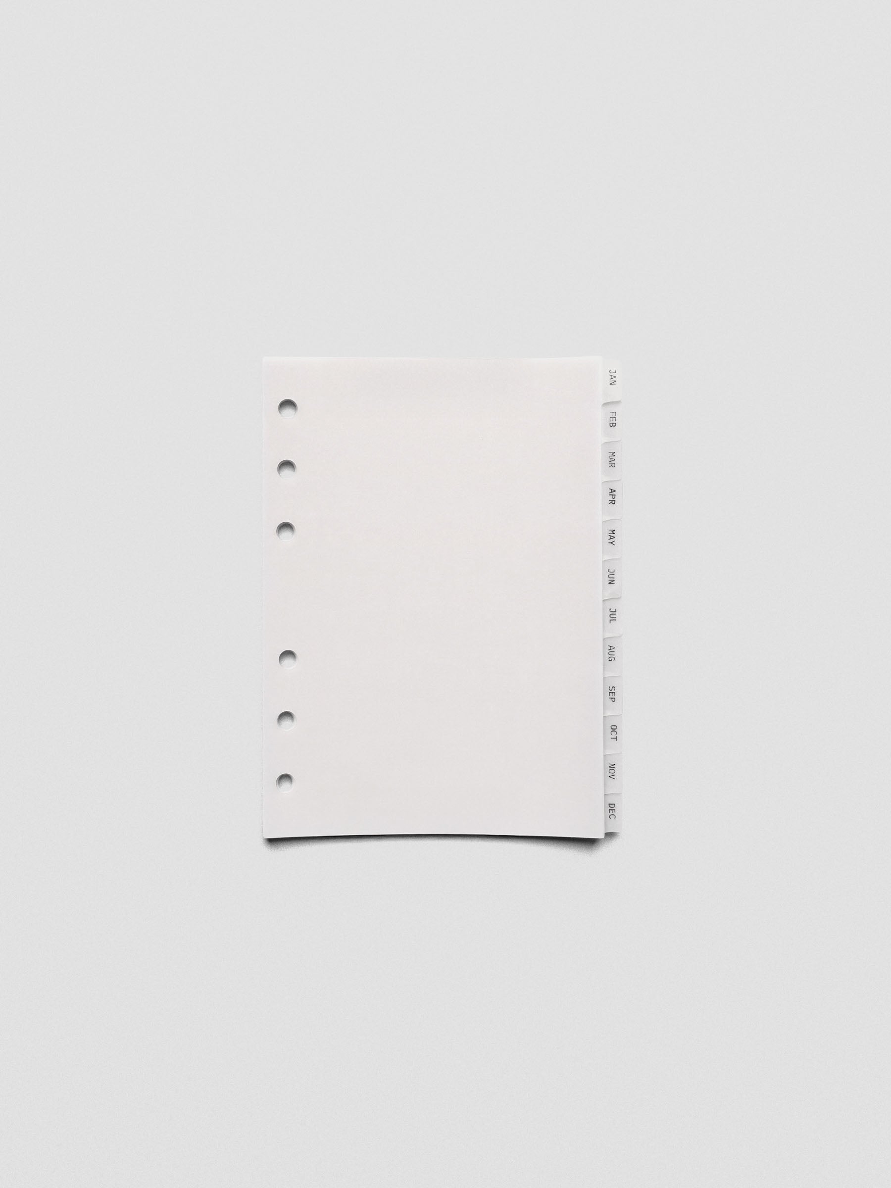 A6 vellum dividers shown on a grey background.