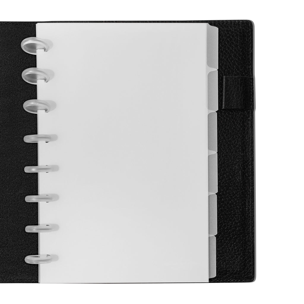 Half Letter Blank side tabs shown in use inside a black leather planner.