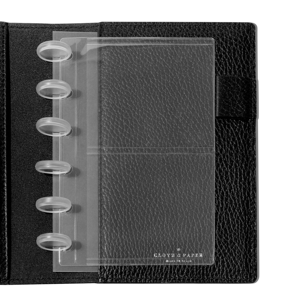 Credit card holders in use inside a black leather folio. Size shown is CP Petite. 