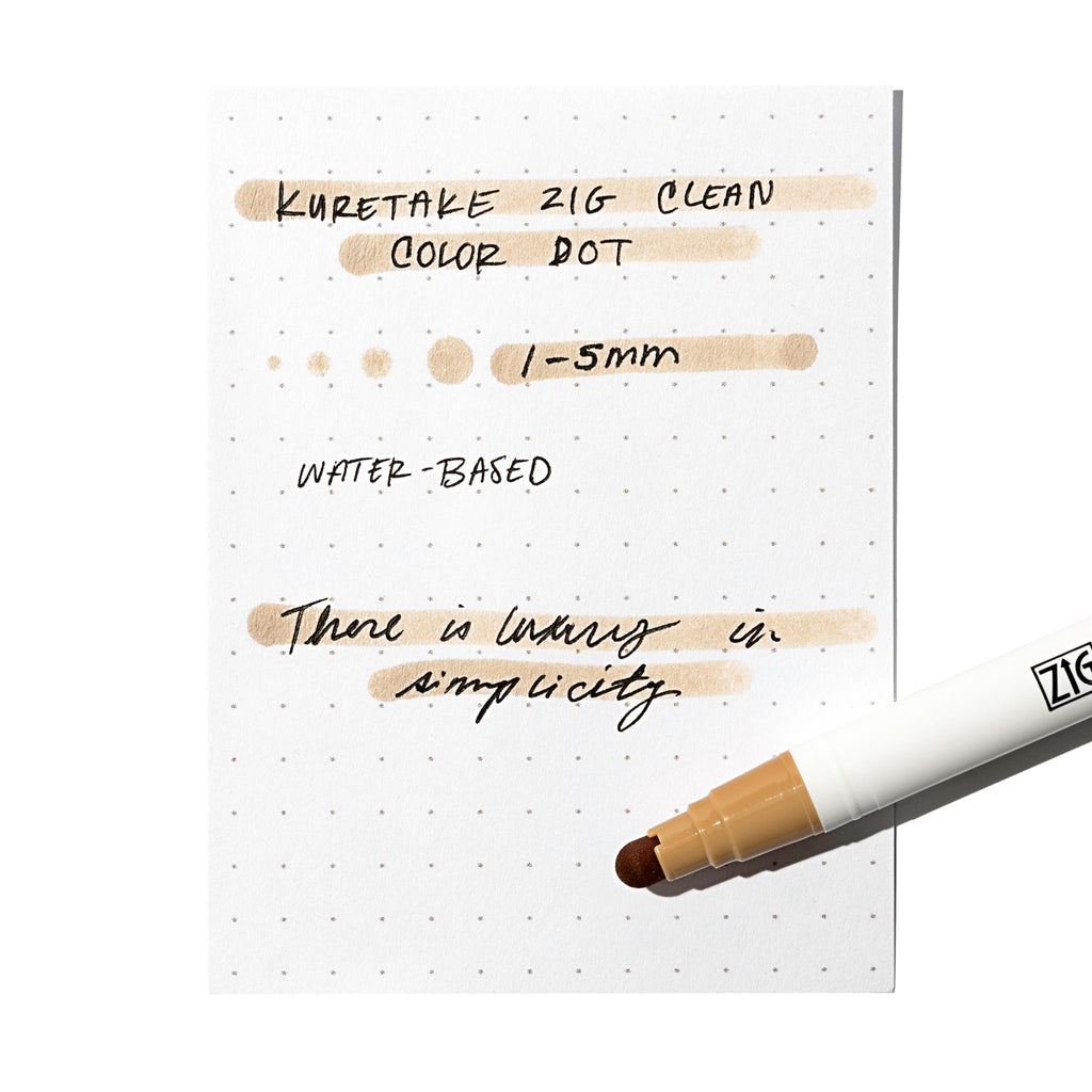 Dot marker displayed on top of an in use pen testing sheet. Color shown is Oatmeal. 