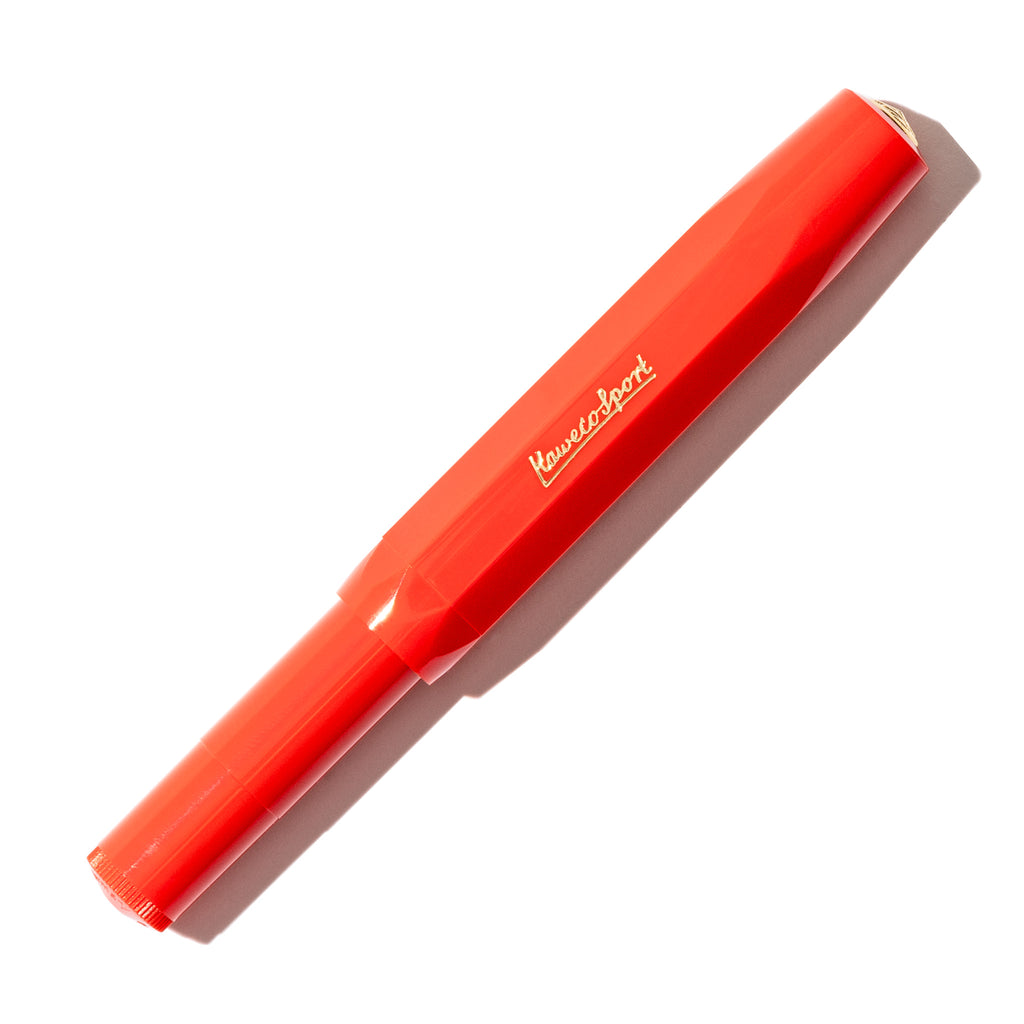Red pen displayed on a white background.
