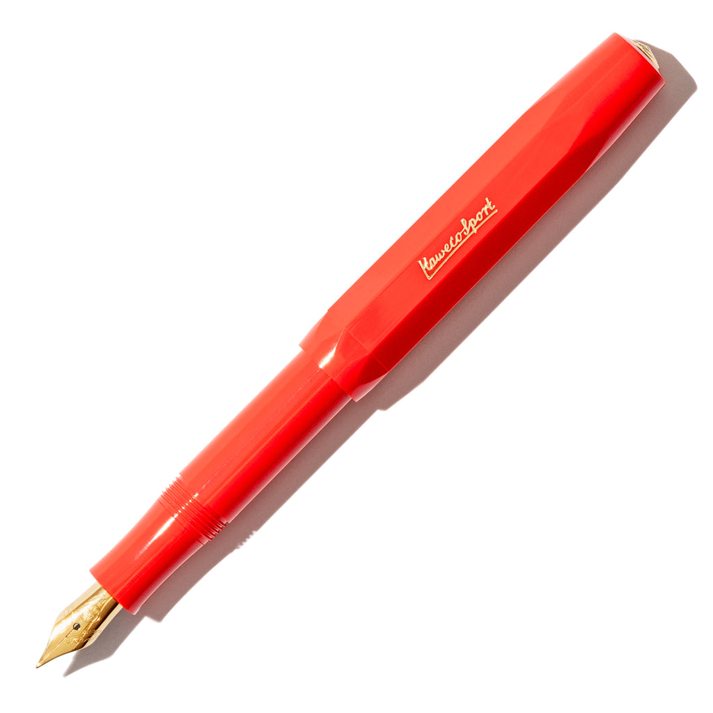 Kaweco Classic Sport Fountain Pen, Fine Nib, Red, Cloth and Paper. Pen displayed on a white background. The pen's nib is exposed.