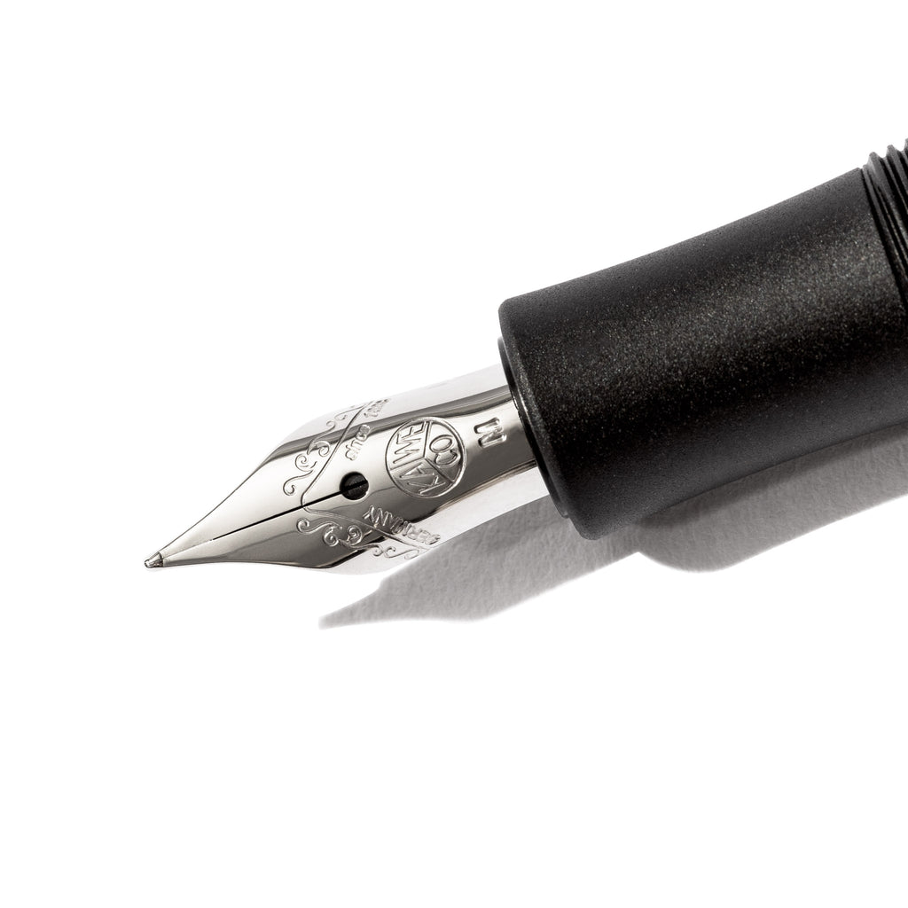 lose up image of pen nib on a white background.