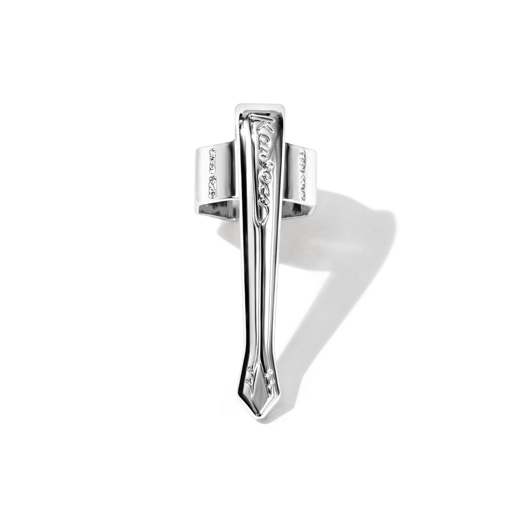 Nostalgic  silver clip displayed on a white background.