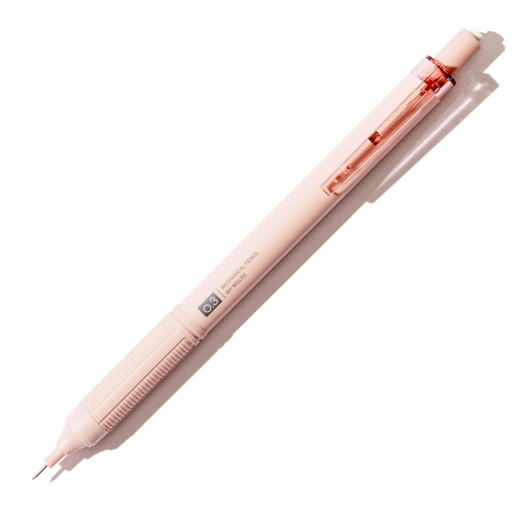 Greyish pink pencil displayed on a white background.