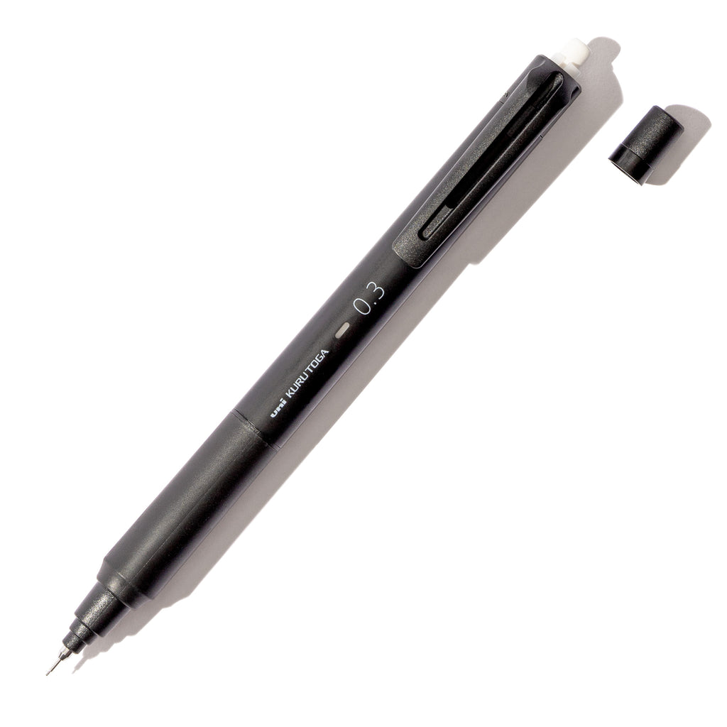 Uni Kuru Toga KS Mechanical Pencil, Cloth and Paper. Black pencil displayed on a white background. 