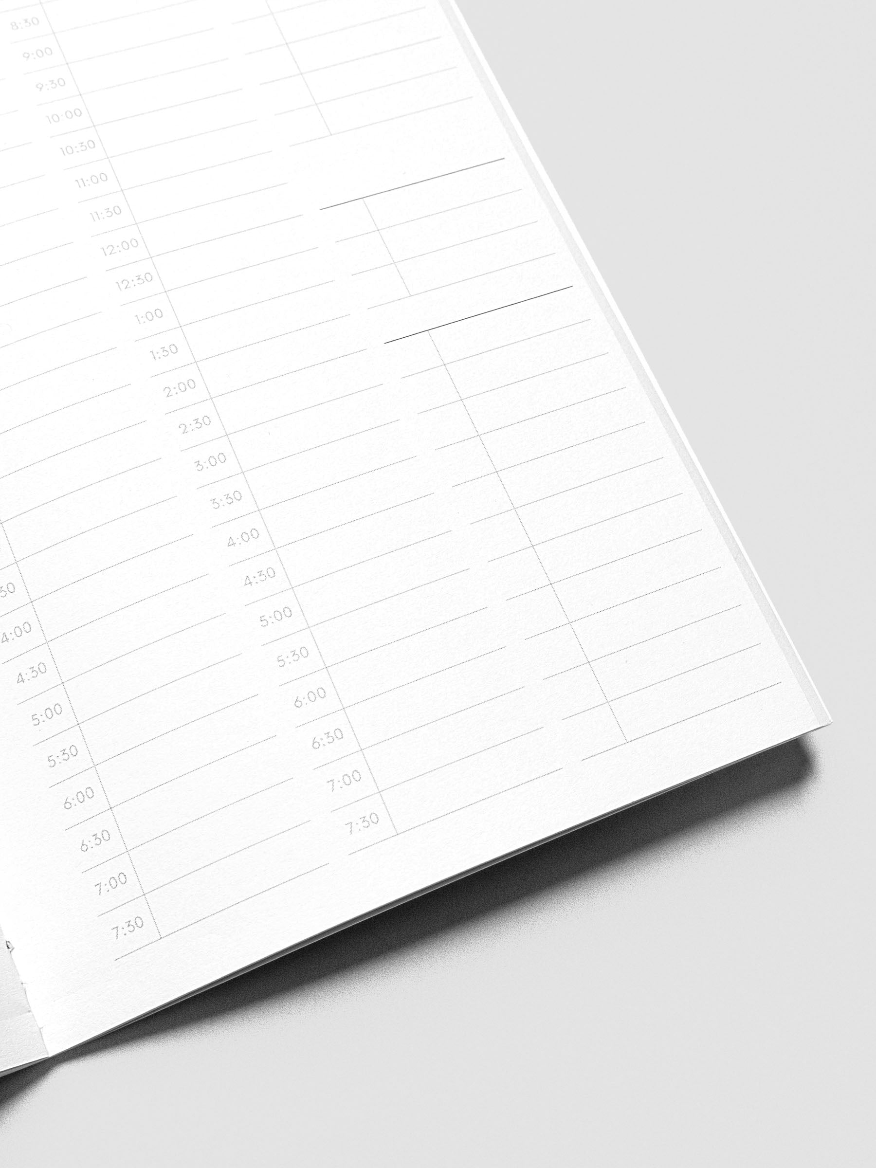 Travel Notebook in size A5 Slim in color Bordeux with 30 Minute Time Block pages with inner pages shown in close up.