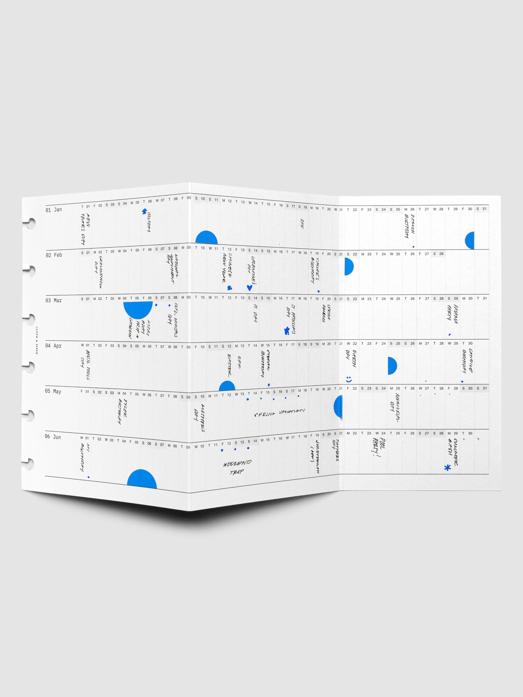 2026 Yearly Fold Out Planner Insert in size CP Petite shown un-folded, in use.