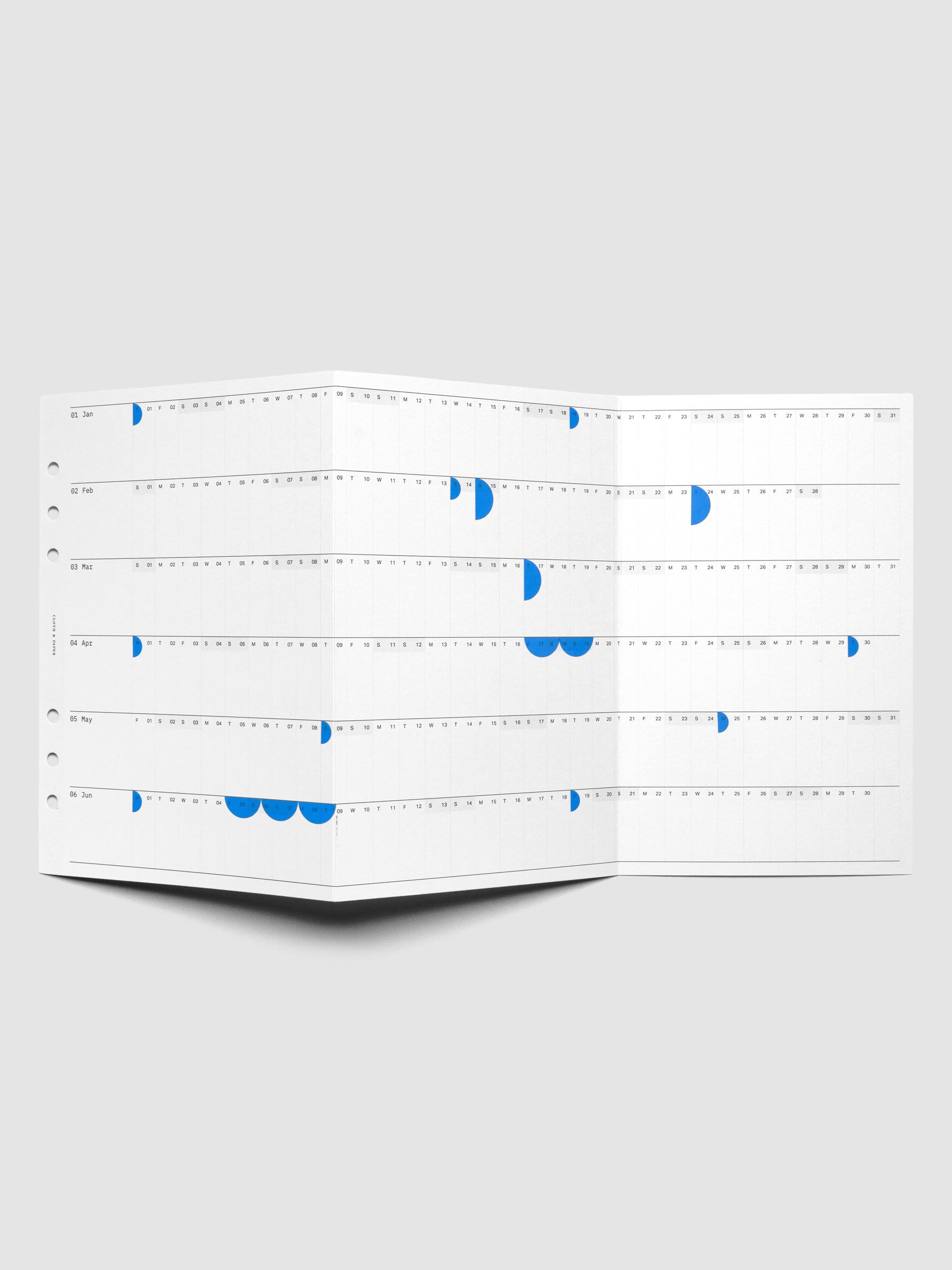 2026 Yearly Fold Out Planner Insert in size A5 shown un-folded, in use with stickers.