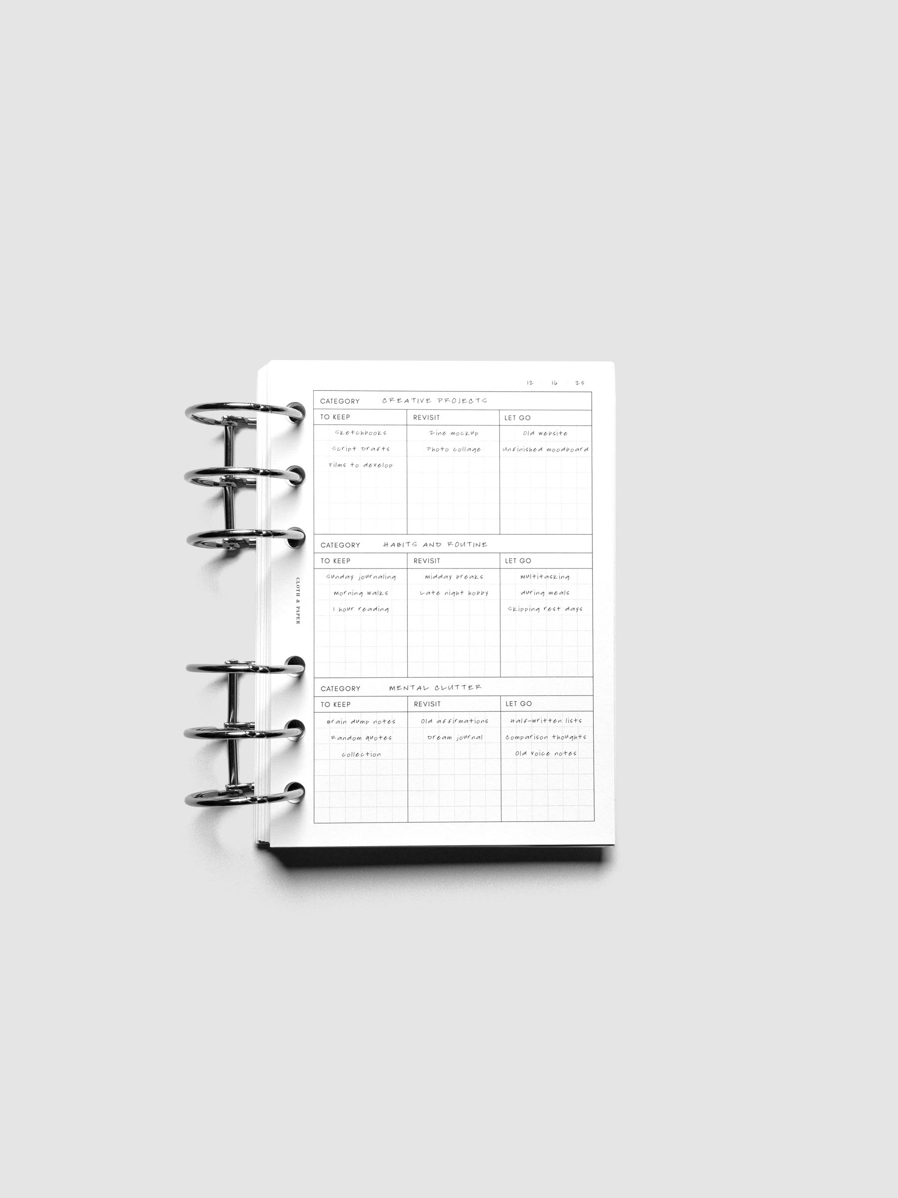 Declutter Planner Inserts in size A6 shown ring bound with handwritten notes.