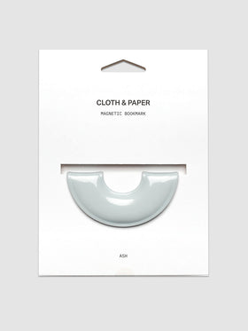 Magnetic Bookmark | Spotlight in the color Ash, a light grey, shown on a backing card