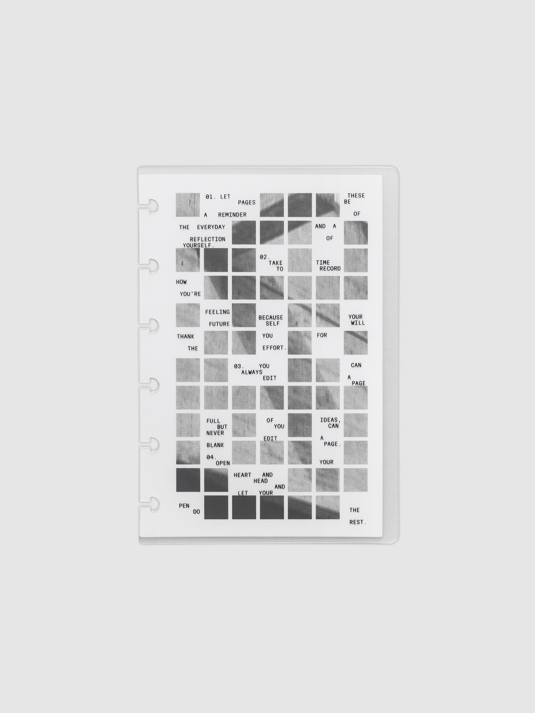 Clear planner cover with black printed text paired with a photographic black and white dashboard. Shown pre-punched for discbound planners in the size CP Petite.
