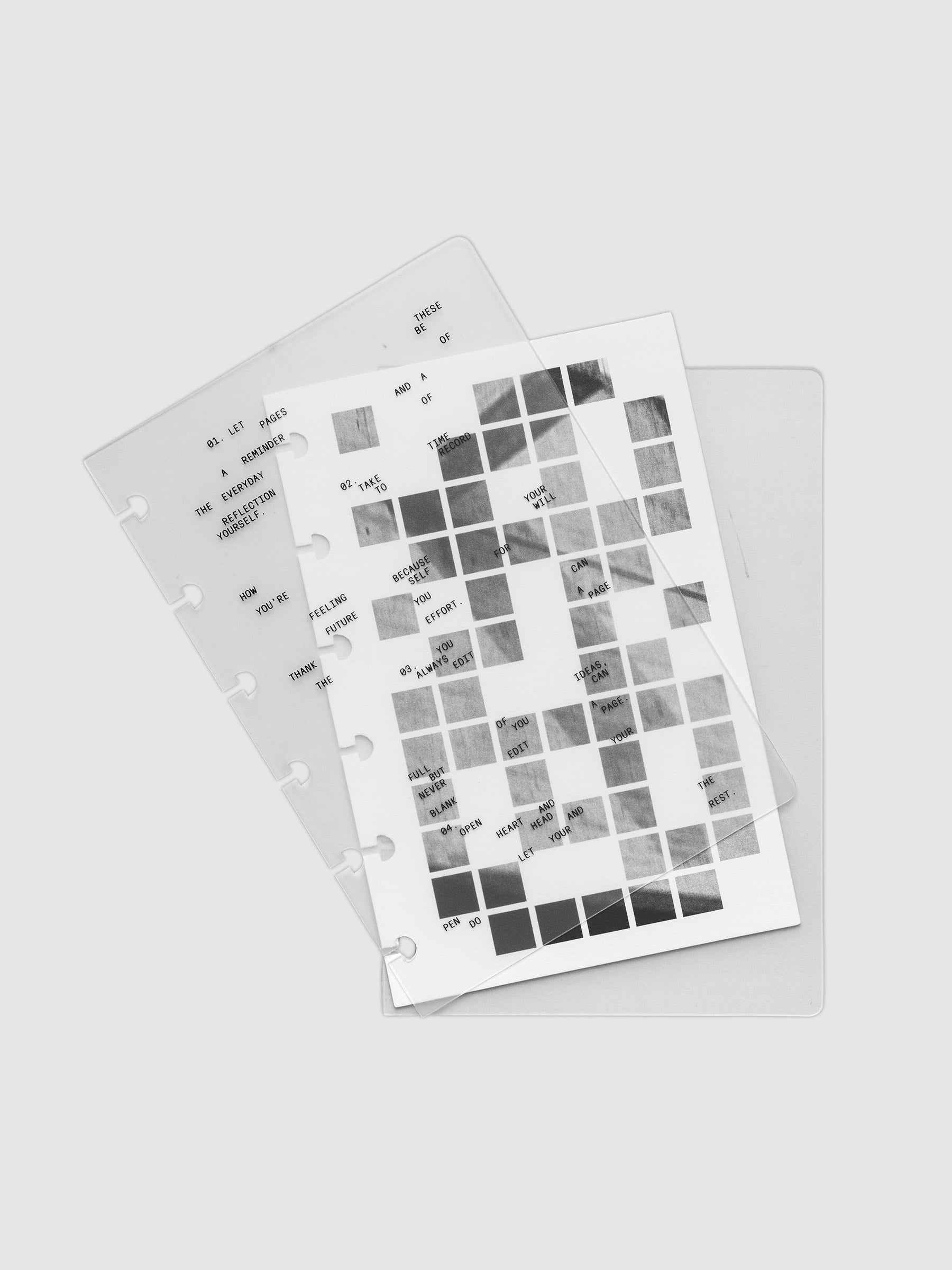 Clear planner cover with black printed text paired with a photographic black and white dashboard. Shown pre-punched for discbound planners in the size CP Petite.