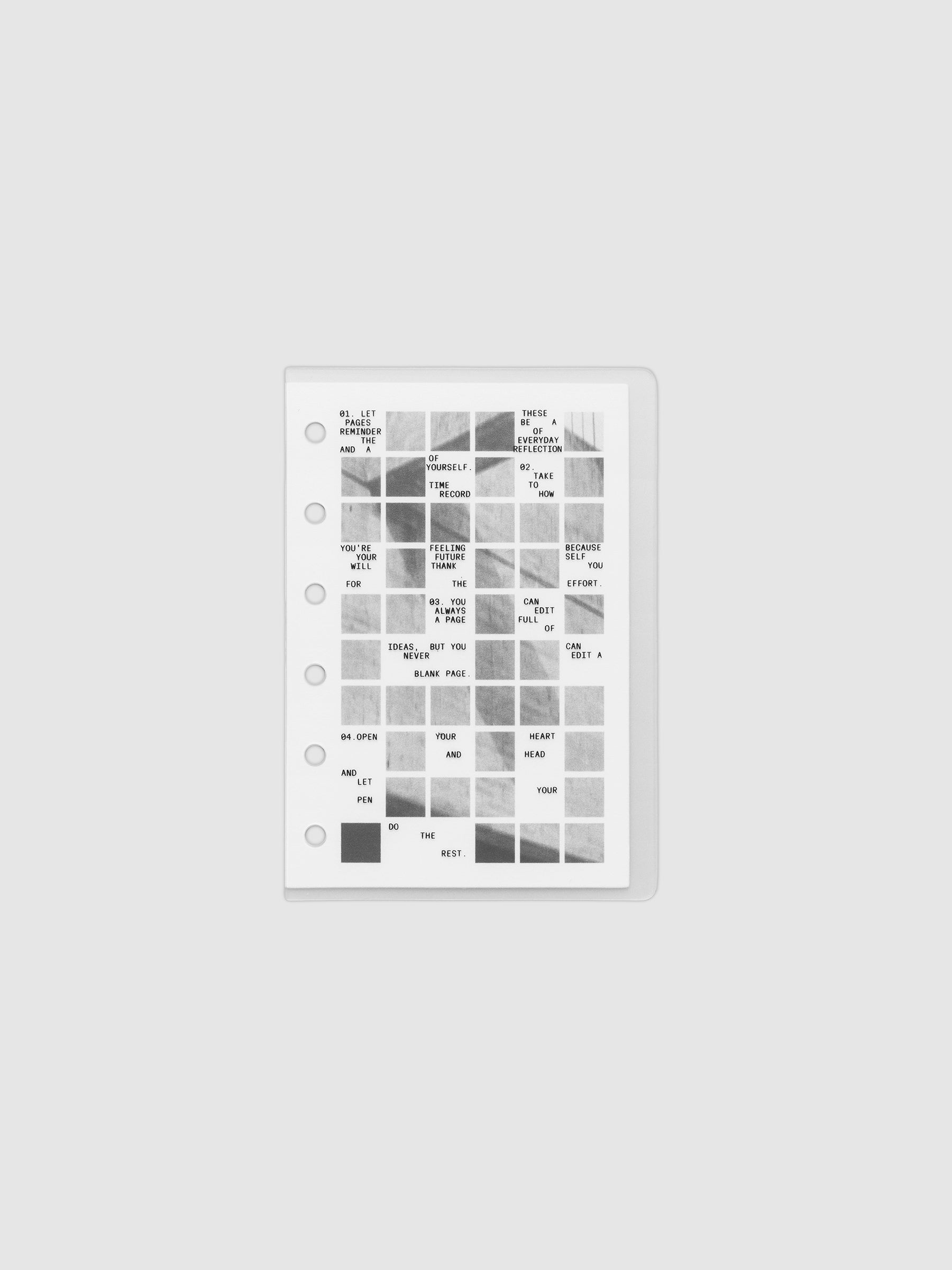 Clear planner cover with black printed text paired with a photographic black and white dashboard. Shown pre-punched for 6-ring planners in the size Pocket.