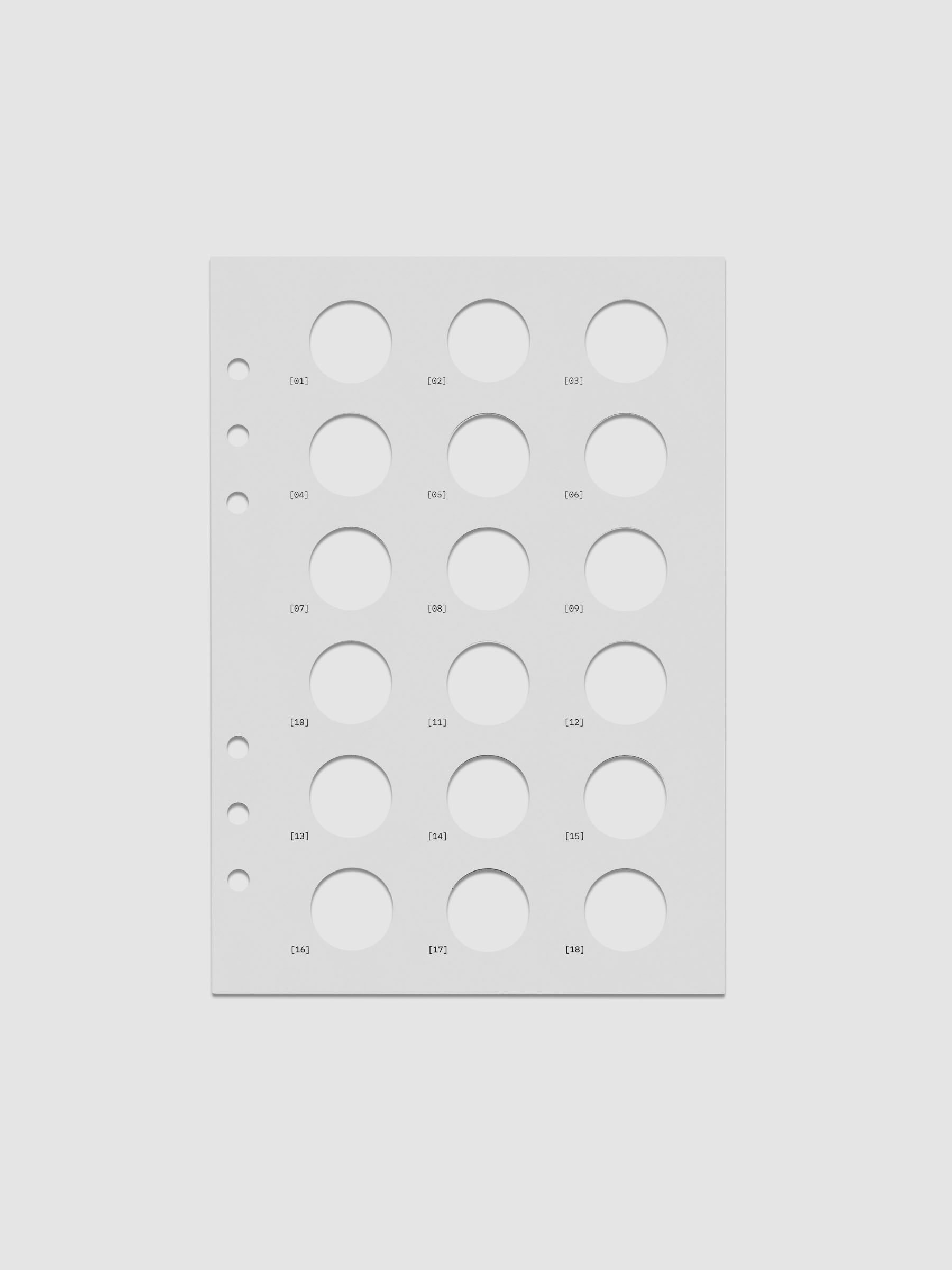 One transparent dashboard with 18 circular cut outs. One piece from the Inner Blueprint Dashboard Duo shown in size A5.