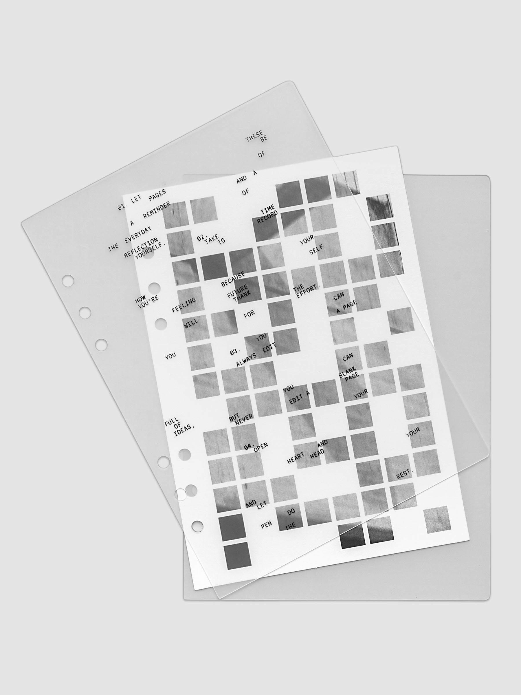 Clear planner cover with black printed text paired with a photographic black and white dashboard. Shown pre-punched for 6-ring planners in the size A5.