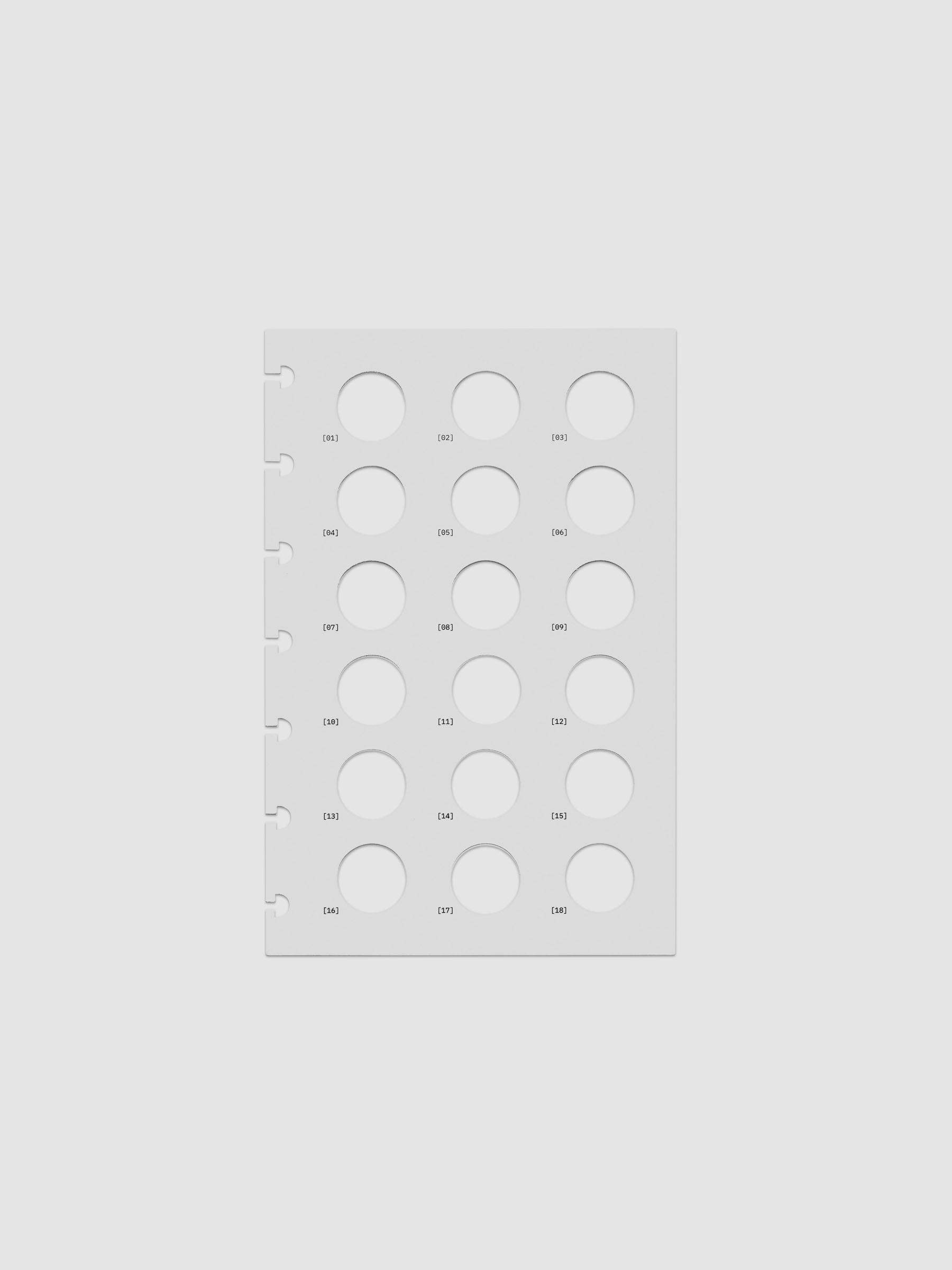 One transparent dashboard with 18 circular cut outs. One piece from the Inner Blueprint Dashboard Duo shown in size HP Mini.