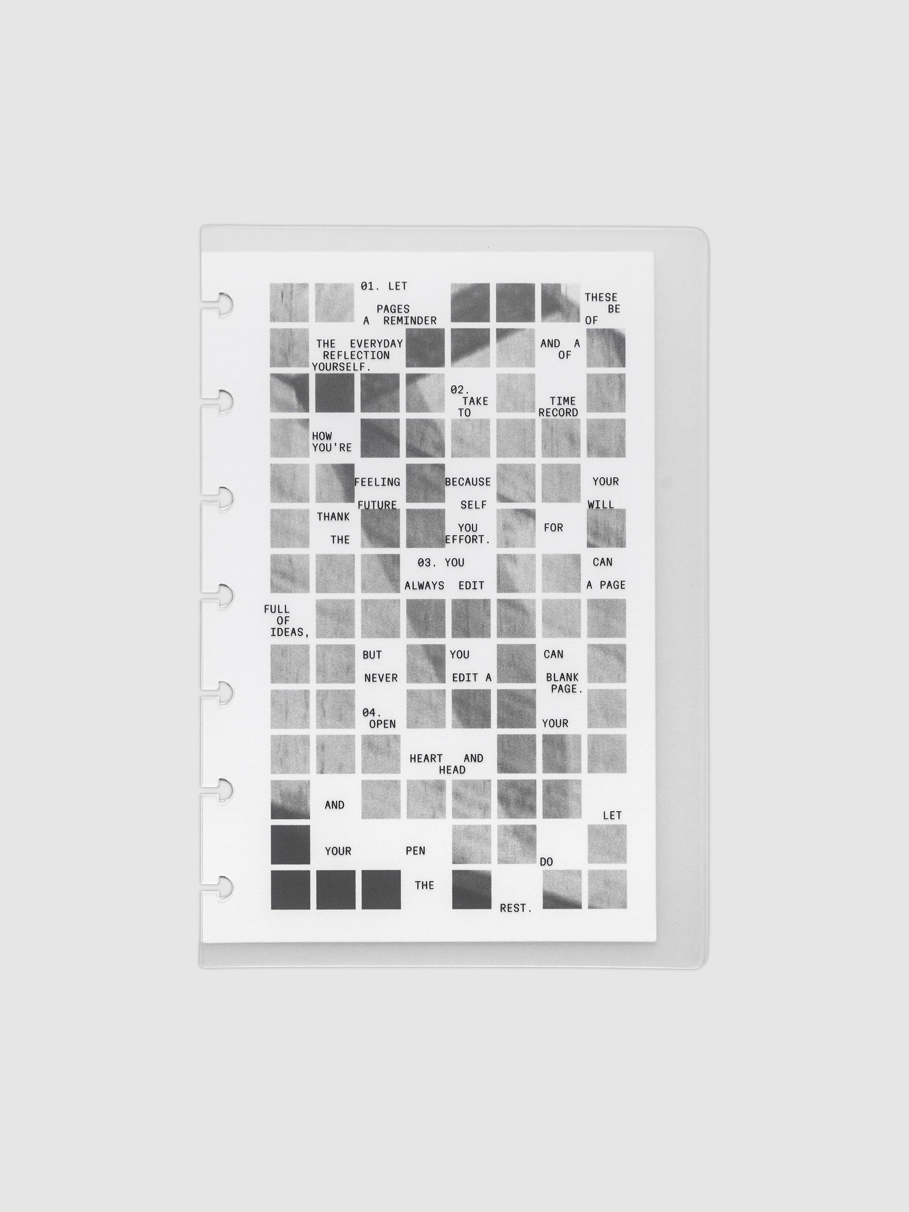 Clear planner cover with black printed text paired with a photographic black and white dashboard. Shown pre-punched for discbound planners in the size HP Mini.
