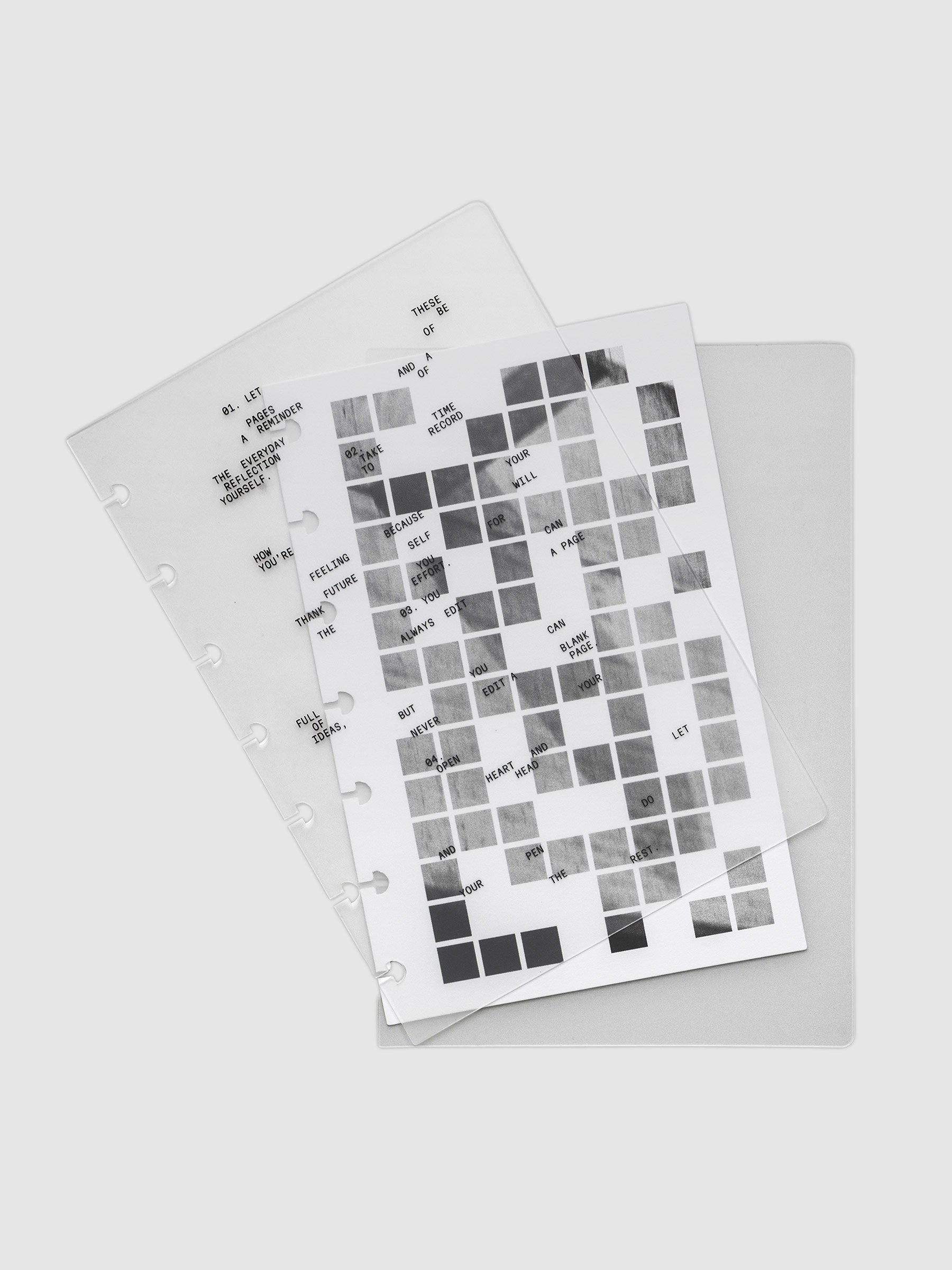 Clear planner cover with black printed text paired with a photographic black and white dashboard. Shown pre-punched for discbound planners in the size HP Mini.
