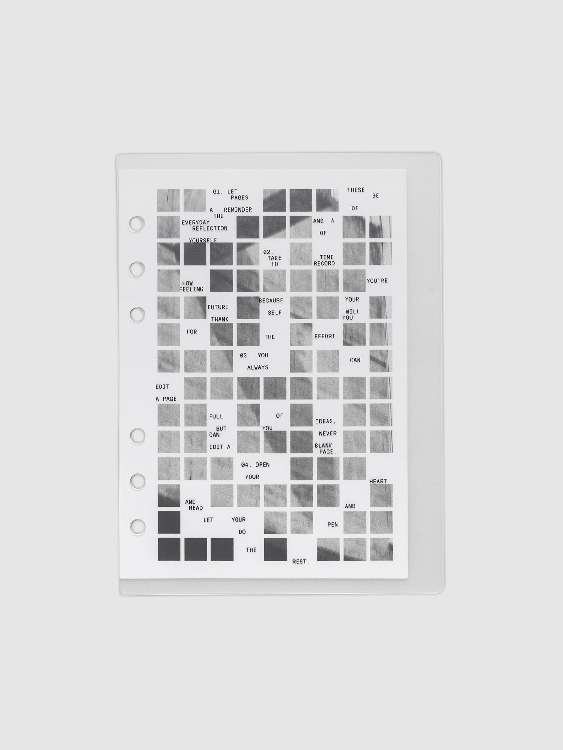 Clear planner cover with black printed text paired with a photographic black and white dashboard. Shown pre-punched for 6-ring planners in the size Personal Wide.