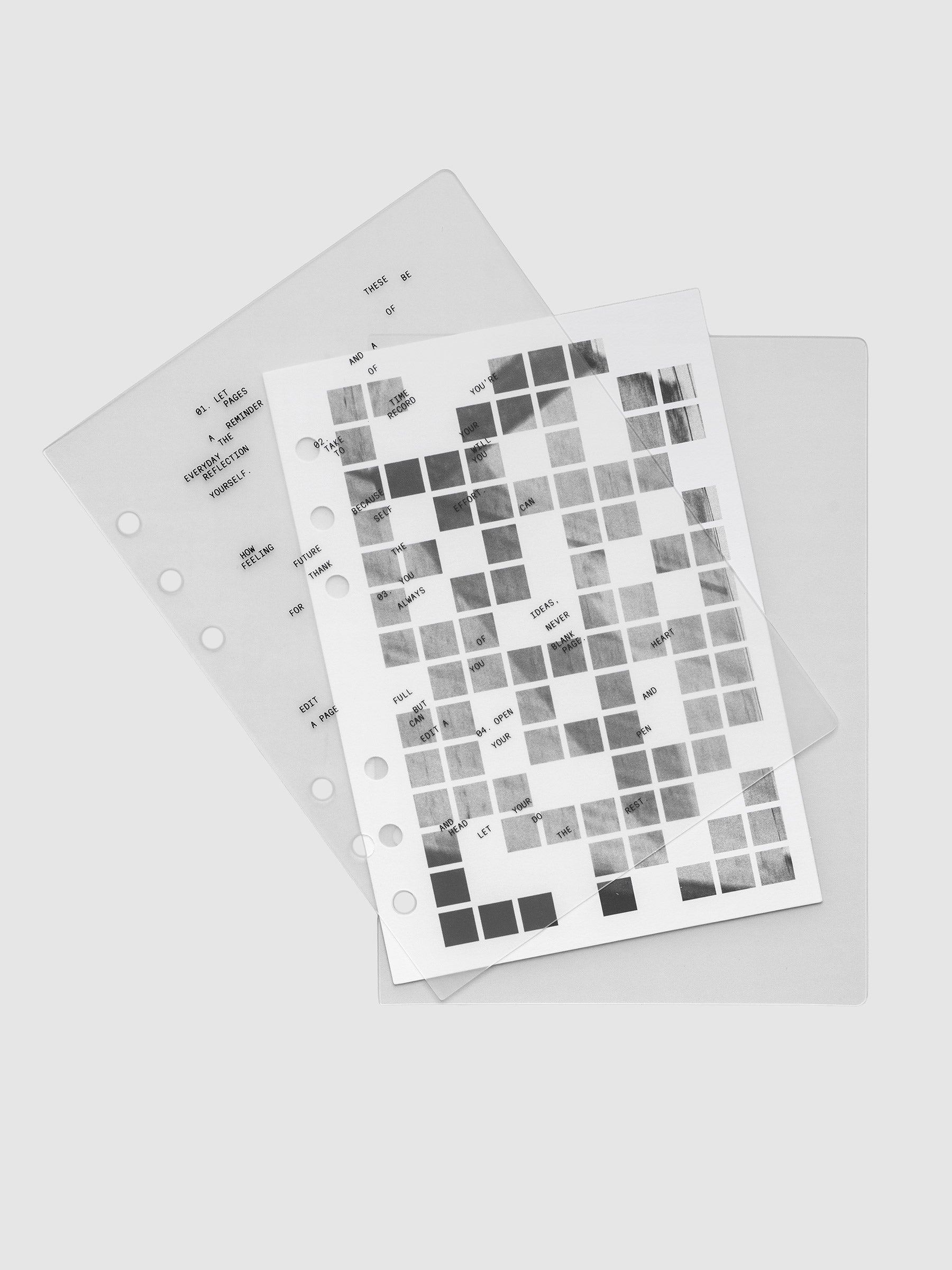 Clear planner cover with black printed text paired with a photographic black and white dashboard. Shown pre-punched for 6-ring planners in the size Personal Wide.