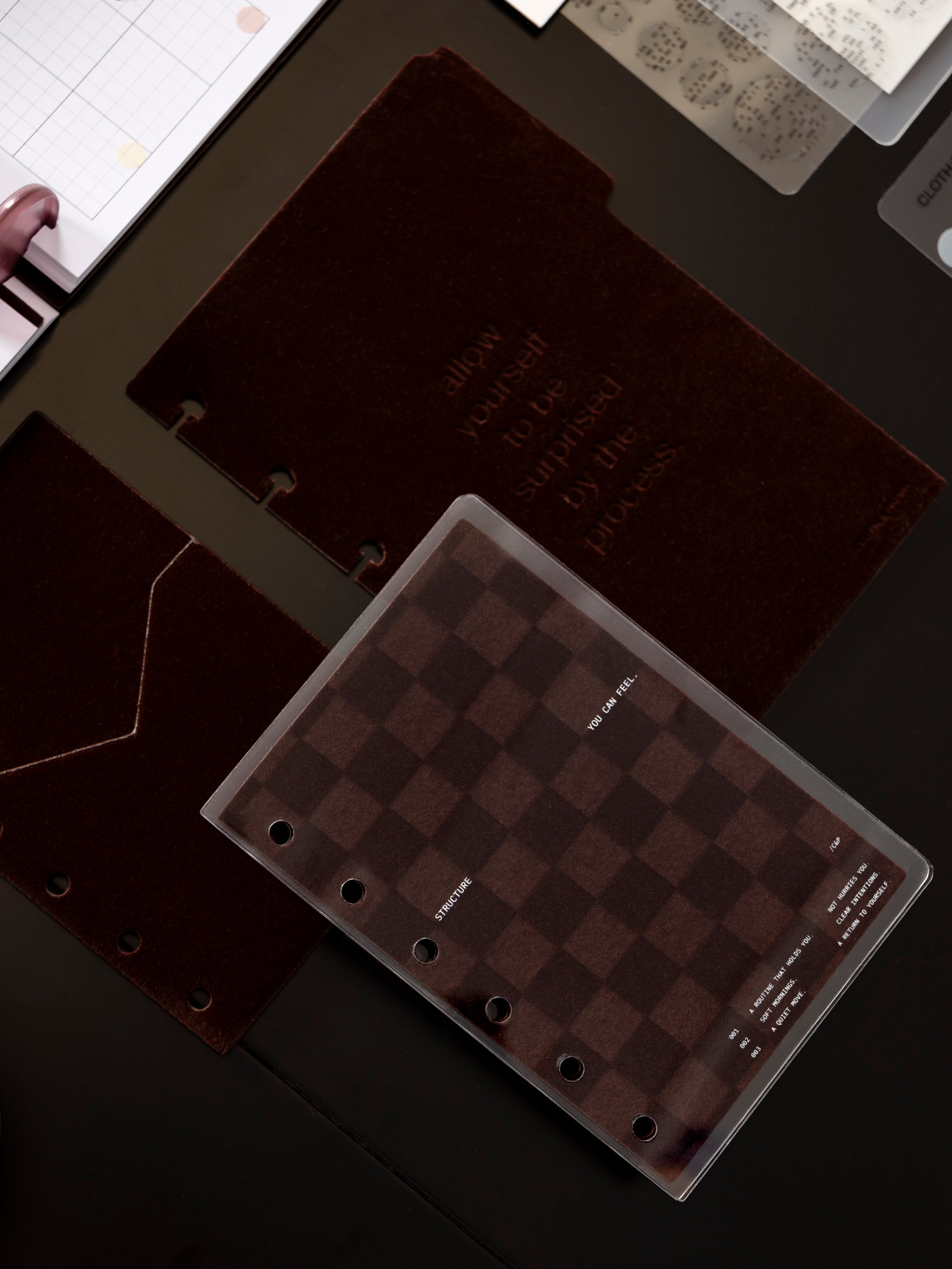 Checker Planner Dashboard + Cover Set shown with other Cloth & Paper products against a dark background.