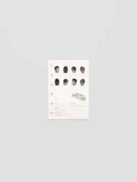 Two layered pocket sized planner dashboards, one semi-transparent, one matte, featuring a fingerprint design.