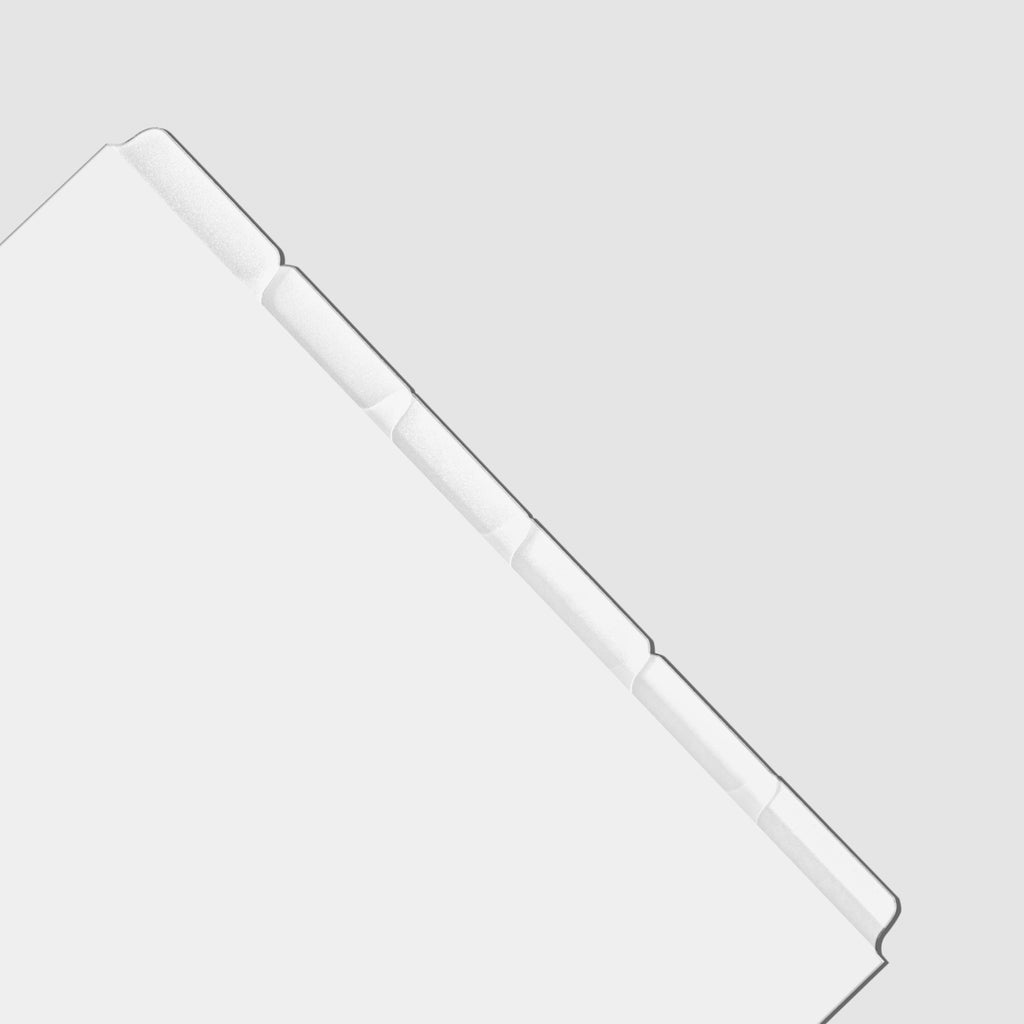 Closeup of blank divider tabs on a gray background.