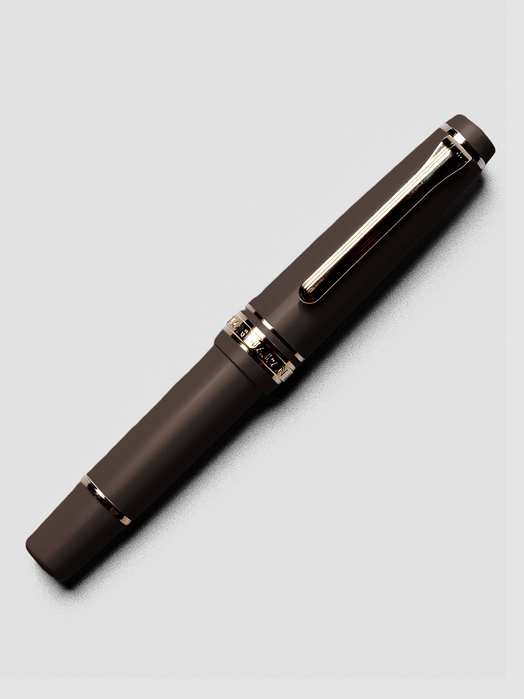 Capped Sailor Pro Gear Slim Mini Fountain Pen in Puff Brown.