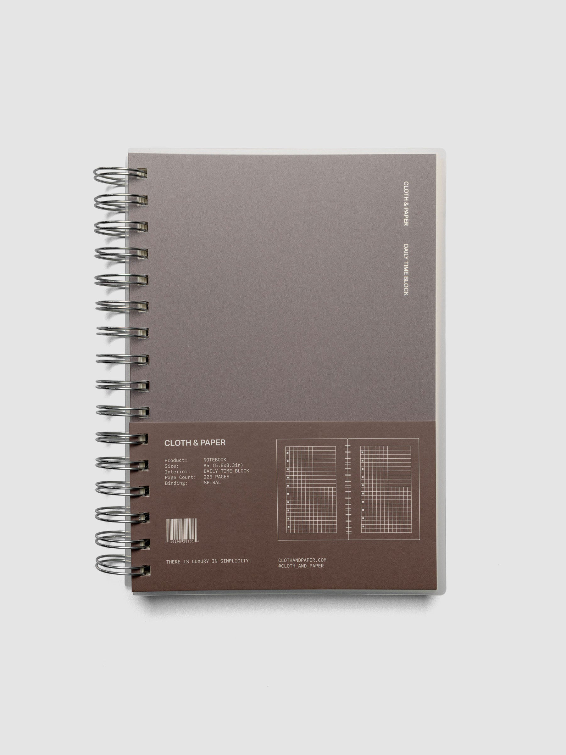 Spiral Notebook in size A5 and color Espresso brown with Daily Time Block interior pages shown closed in packaging.