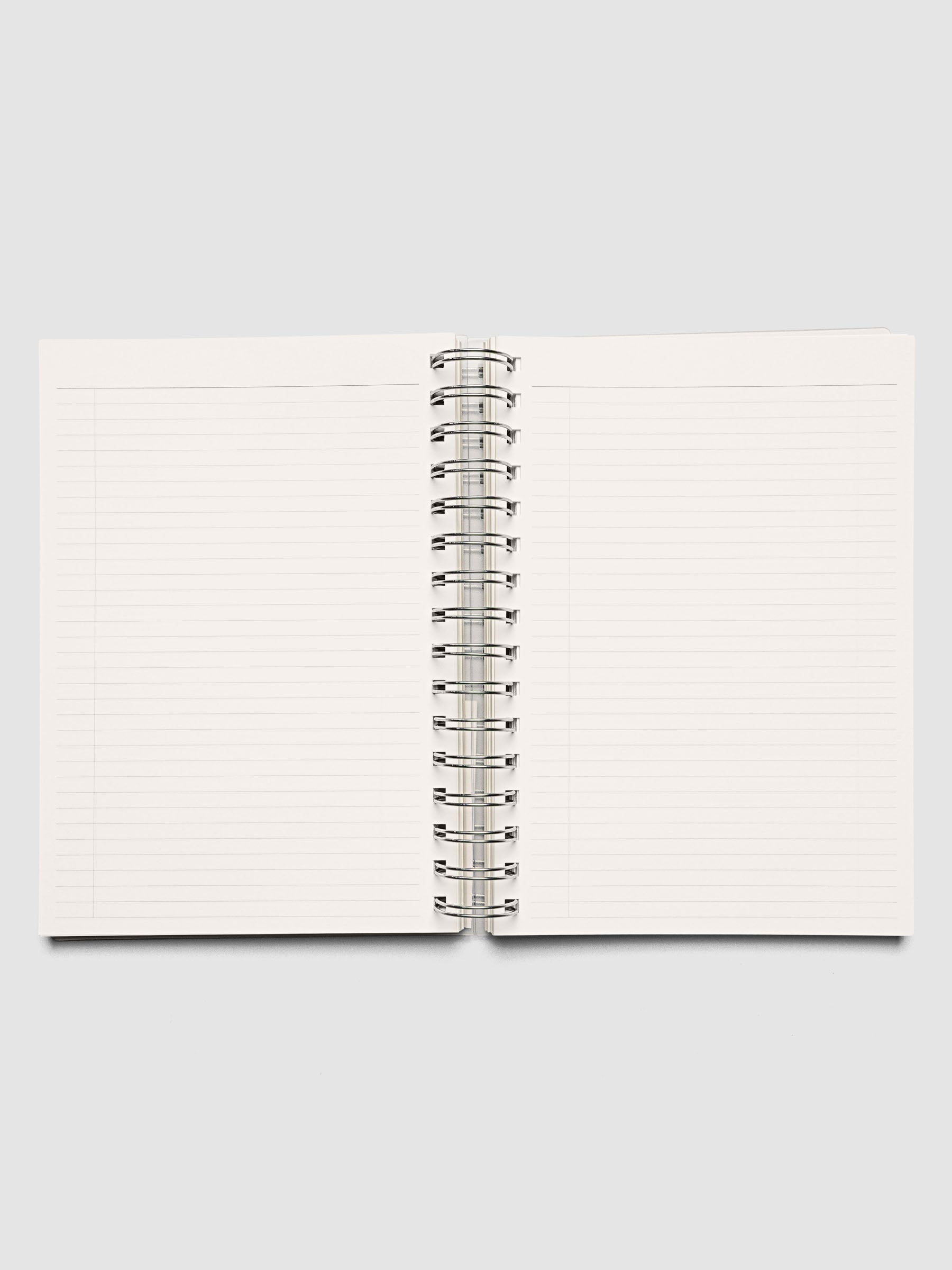 Spiral Notebook in size A5 and color Ristretto beige with Task interior pages shown open.